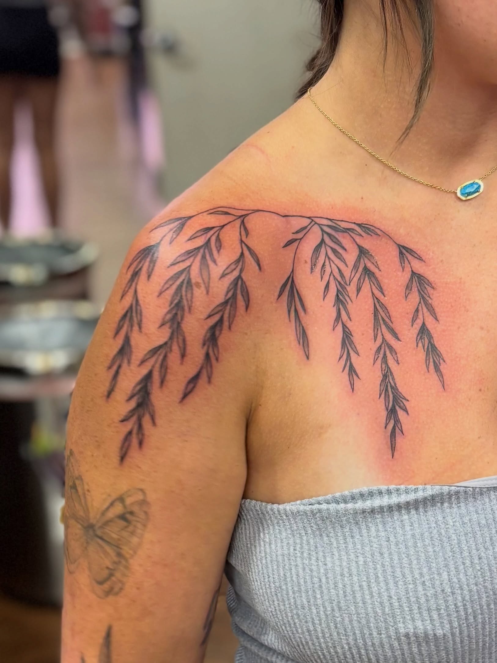 Weeping willow branches black and grey tattoo on the shoulder by Thom Johns-Green