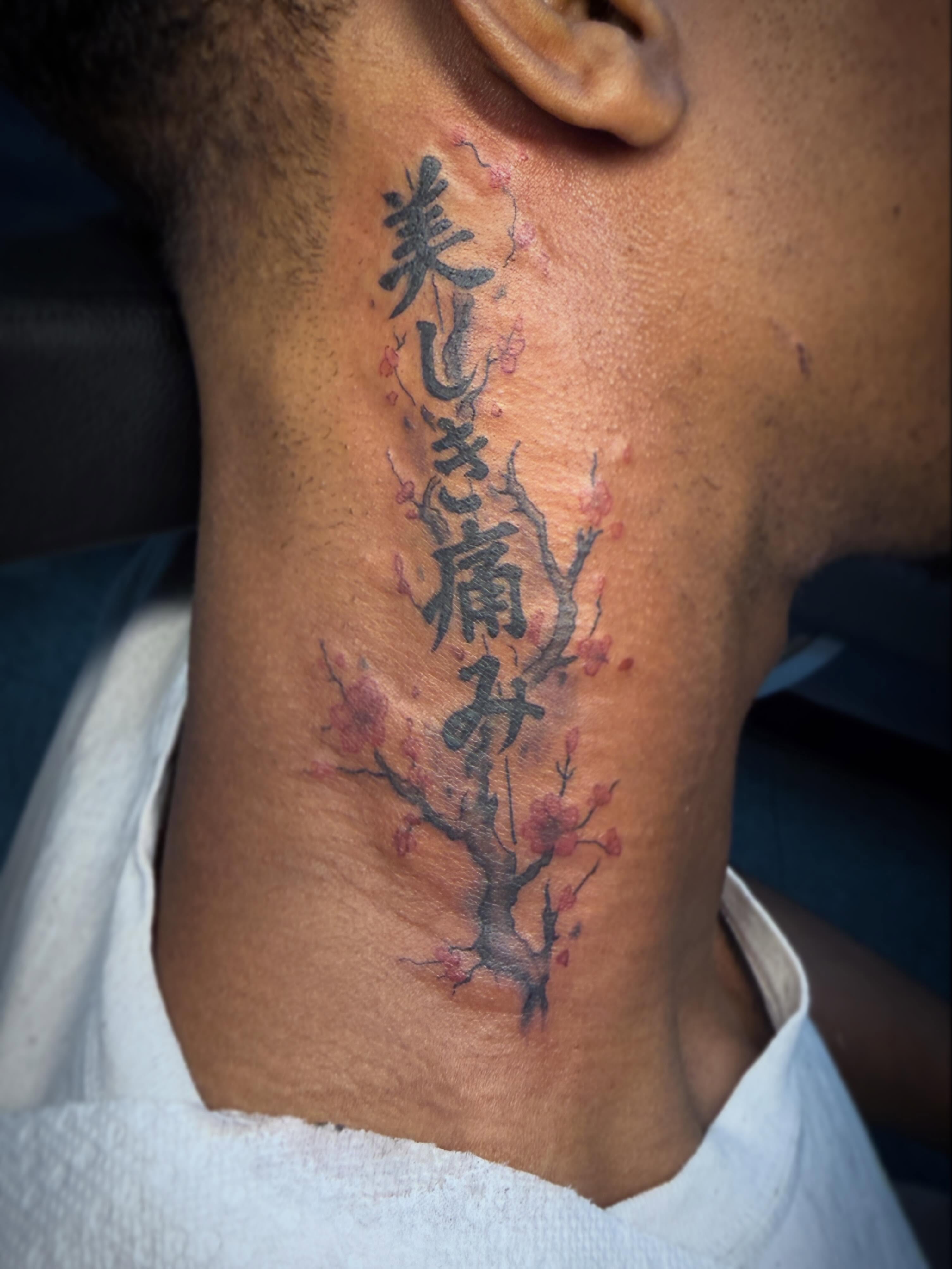 Cherry blossom and kanji japanese irezumi tattoo on the neck by sᴋᴇᴛᴄʜᴇᴅ