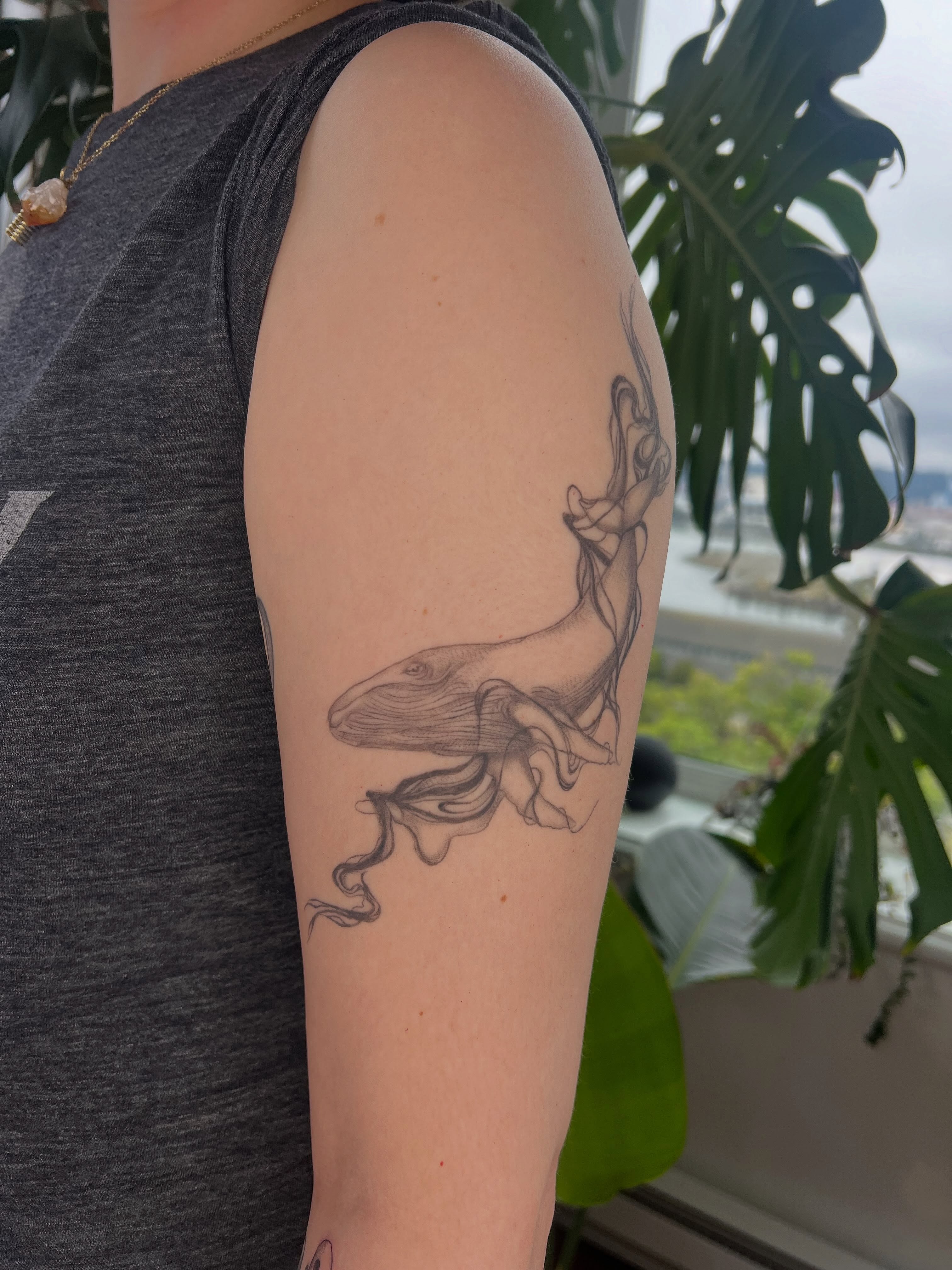 Whale and smoke black and grey tattoo on the forearm by Jordi WA Tacoma Tattooer