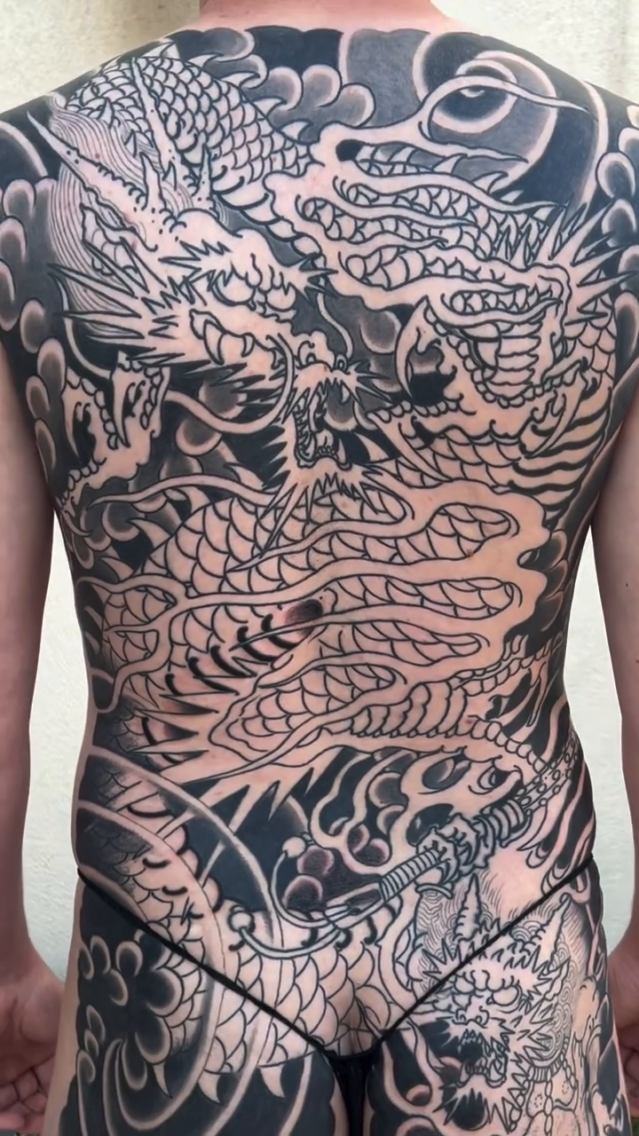 Dragon and waves japanese irezumi tattoo by Kayle Leogrande
