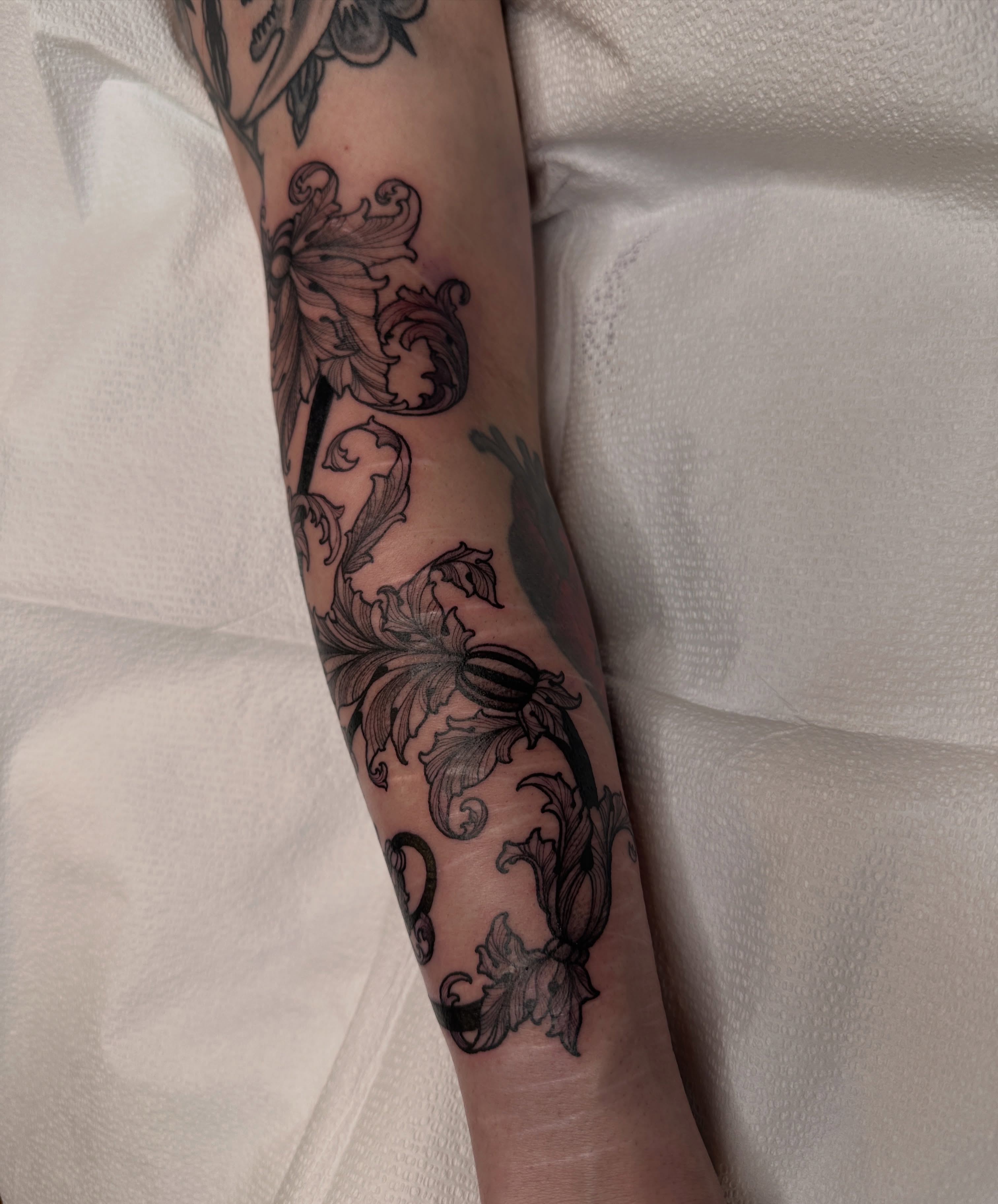 Floral vine black and grey tattoo on the forearm by abigail 🌸
