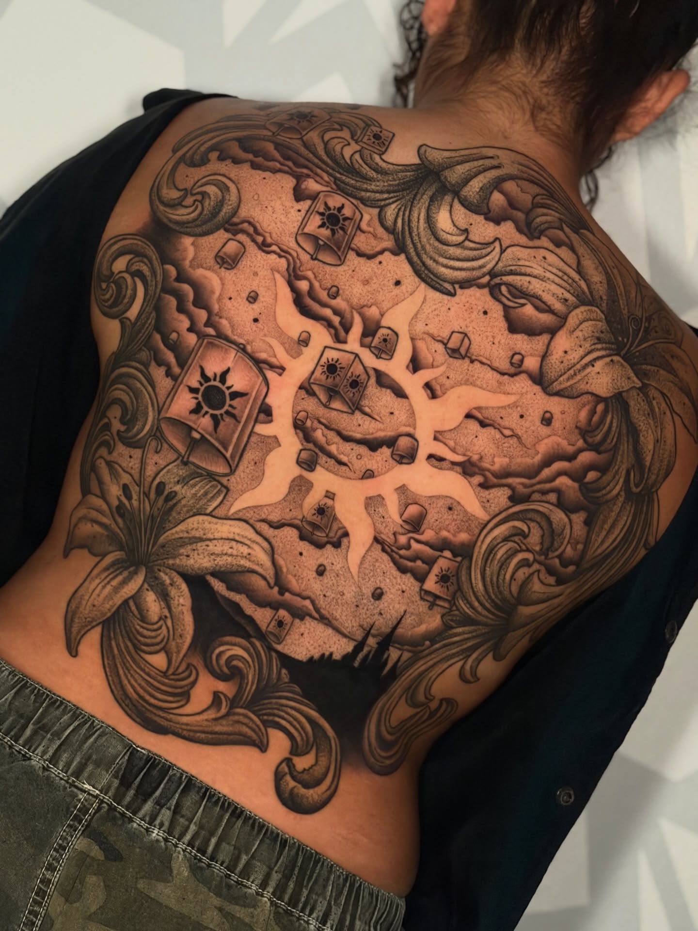 Map and celestial symbols dotwork tattoo on the back by Las Vegas Tattoo Artist