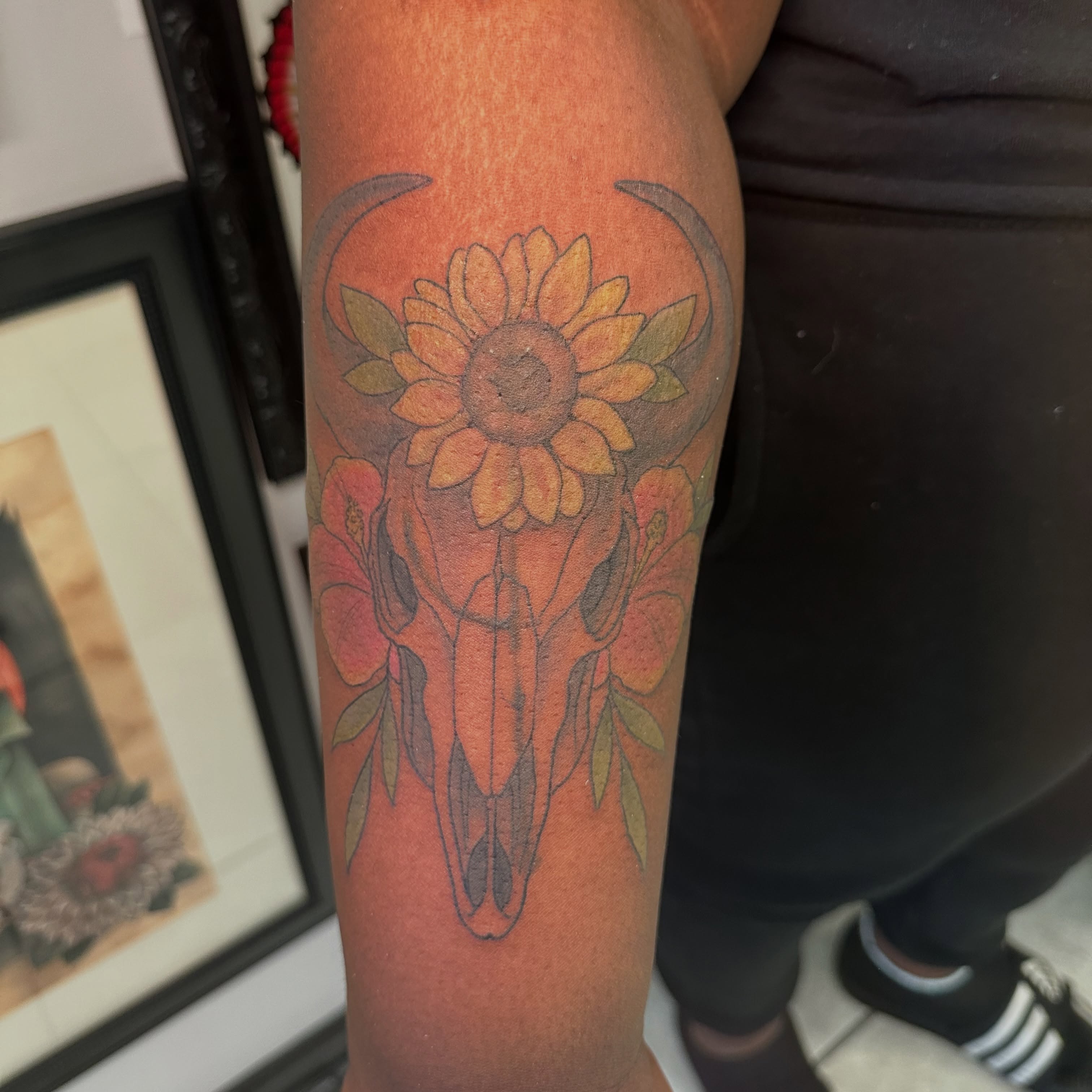 Sunflower skull American traditional tattoo on the forearm by Mia Layne 🤎