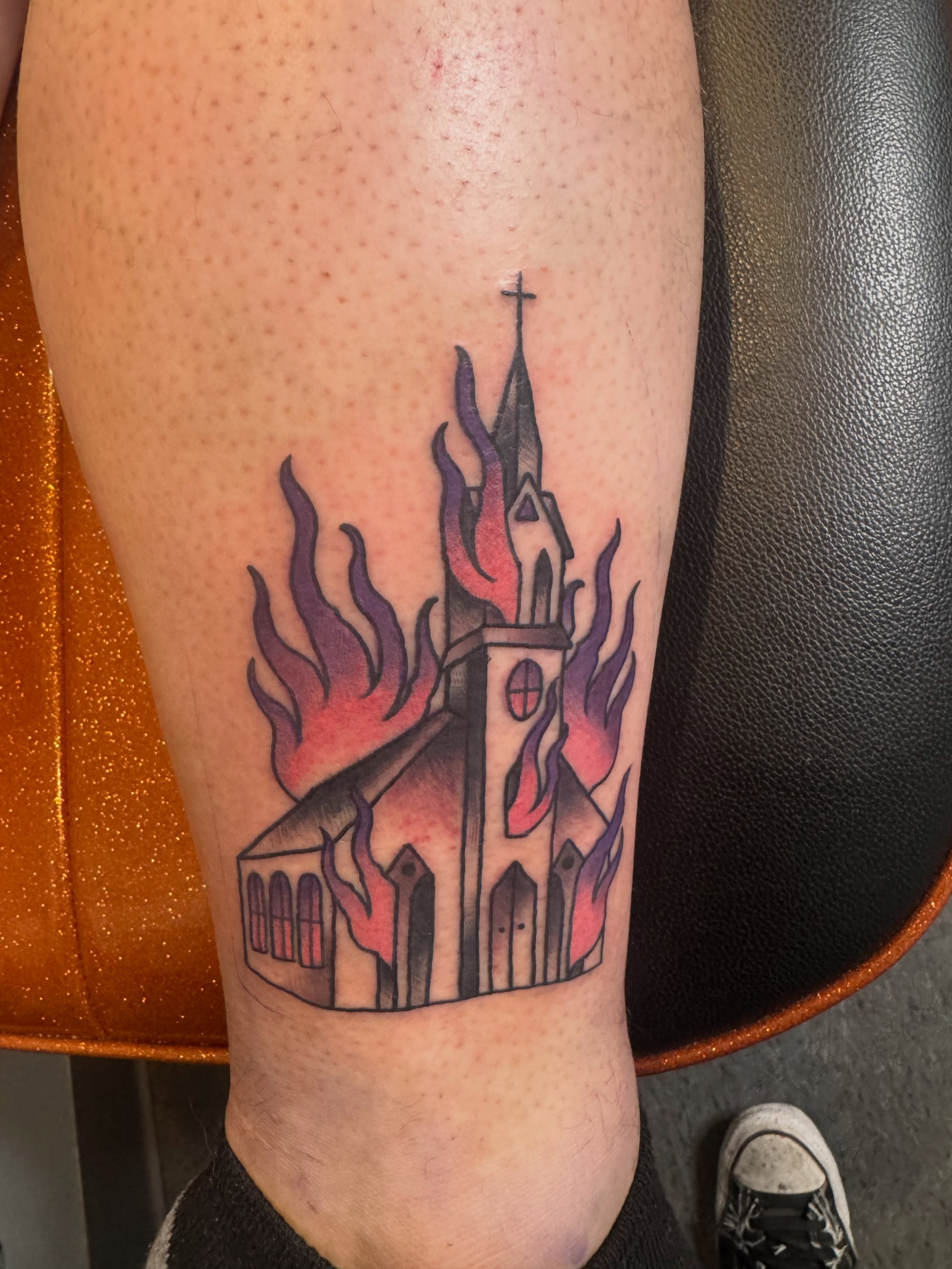Burning church neo-traditional tattoo on the forearm by Mike Bean, Minneapolis, Minnesota