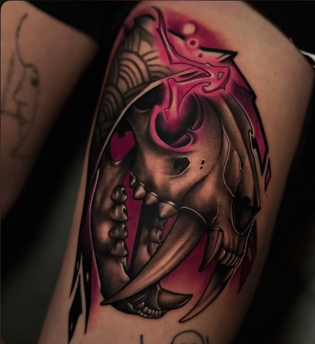 Skull and flames dark realism tattoo on the thigh by Jaxx Kesler