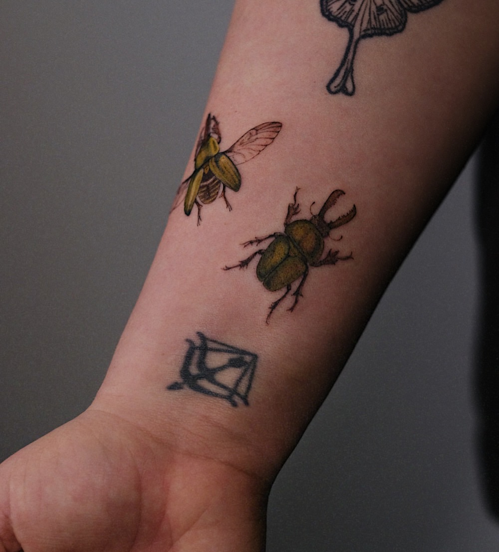 Insects realism tattoo on the forearm by Temple Adorned Tattoo