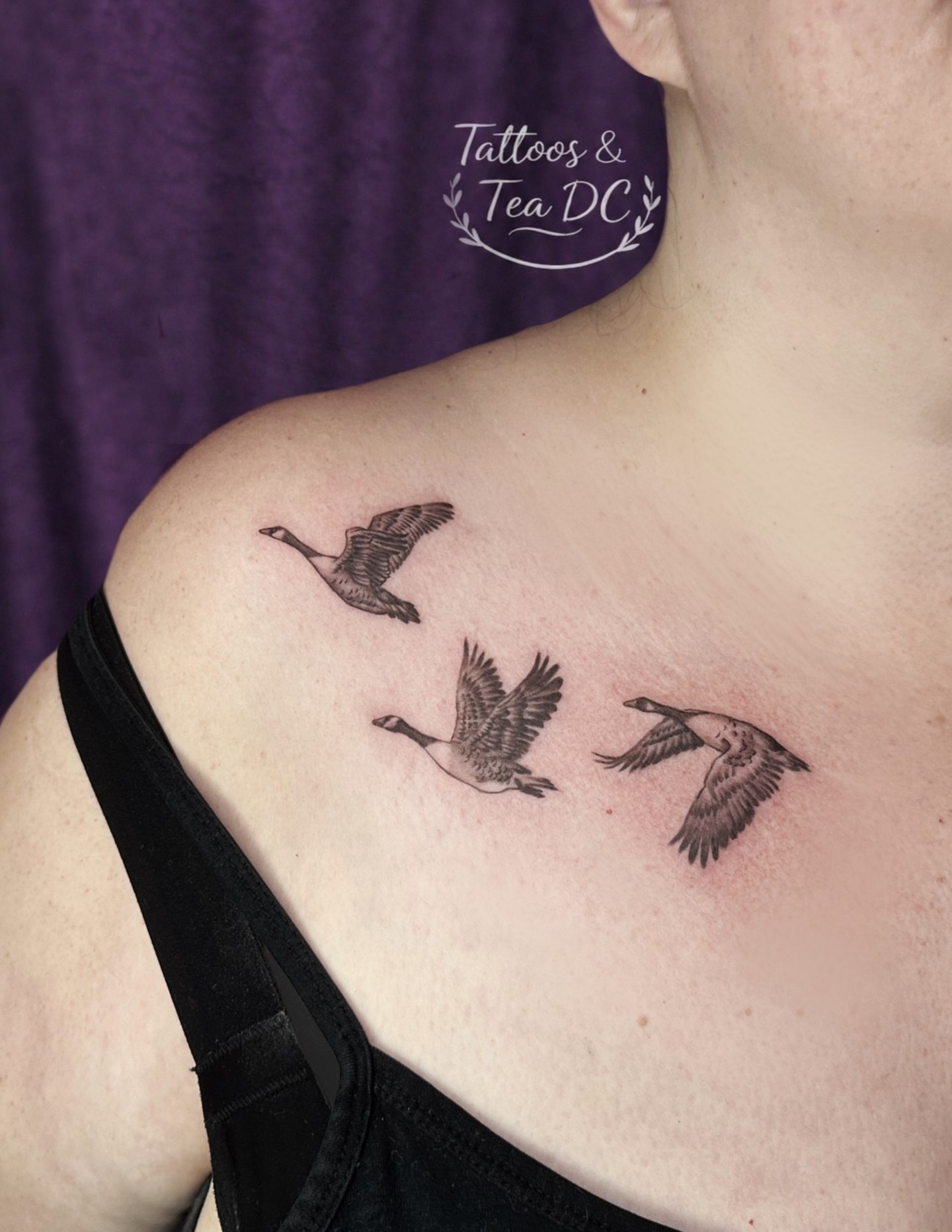Geese in flight black and grey tattoo on the shoulder by Tattoos & Tea DC, Arlington, Virginia