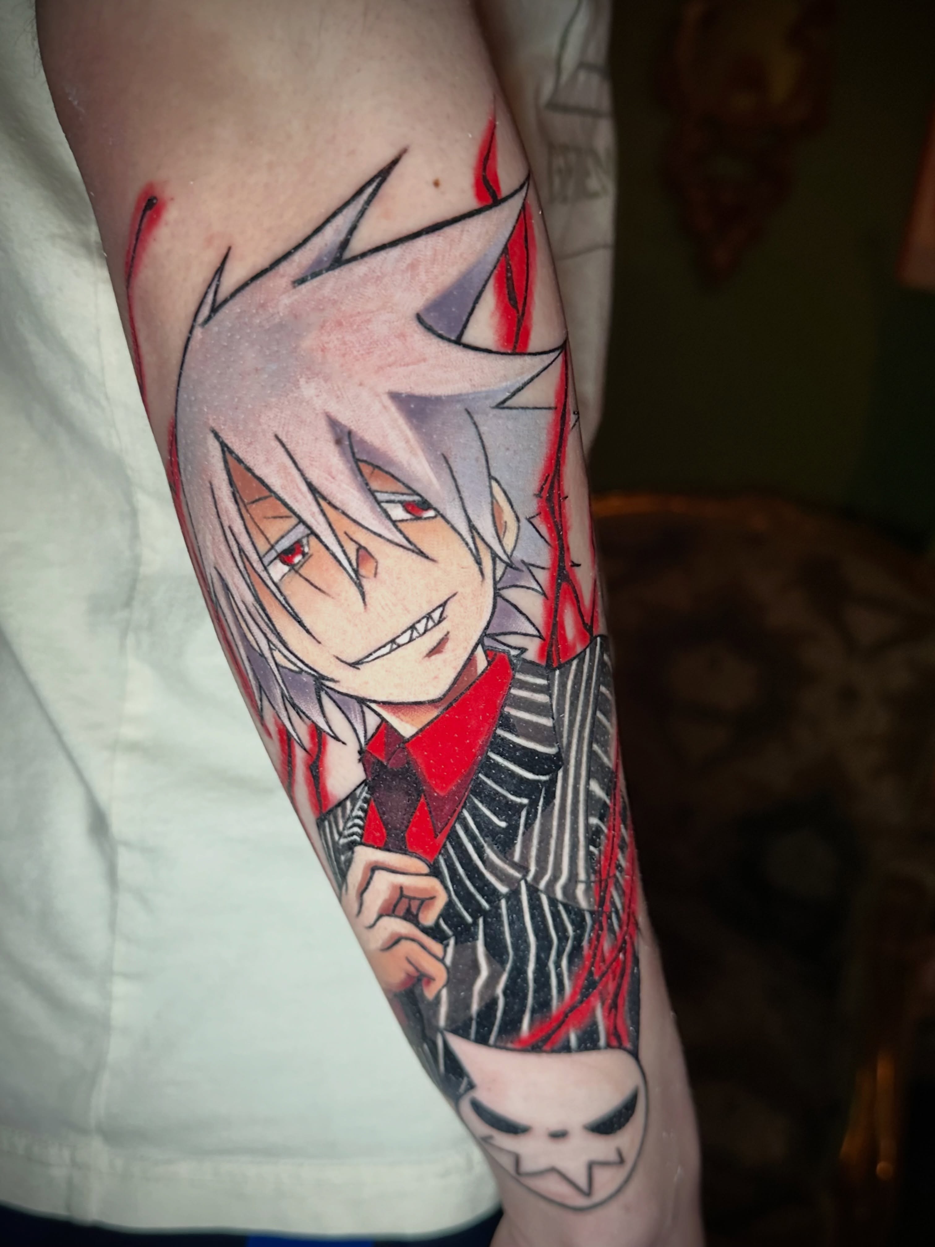 Anime character anime tattoo on the forearm by Alfred