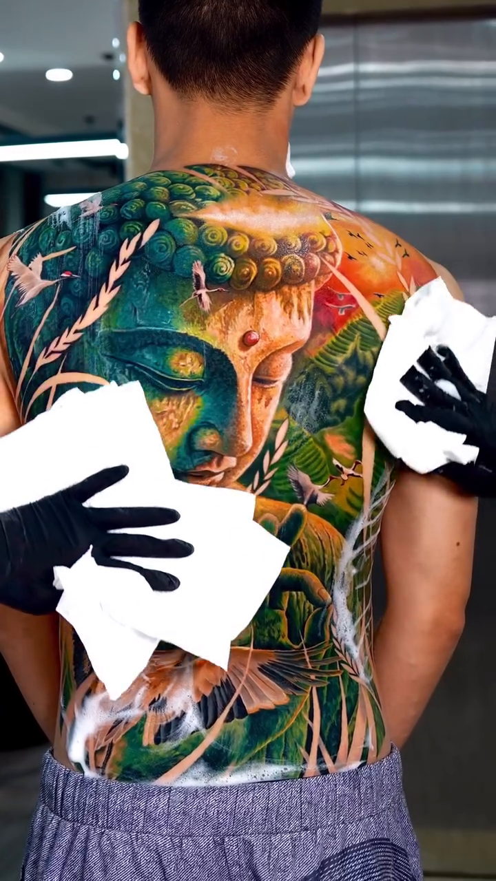 Buddha face with cranes and foliage japanese irezumi tattoo by Hiroto Nguyen, Perth, Western Australia