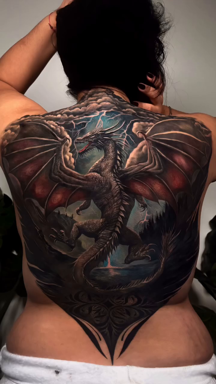 Dragon back piece realism tattoo on the back by ✨ Tattoo Artist
