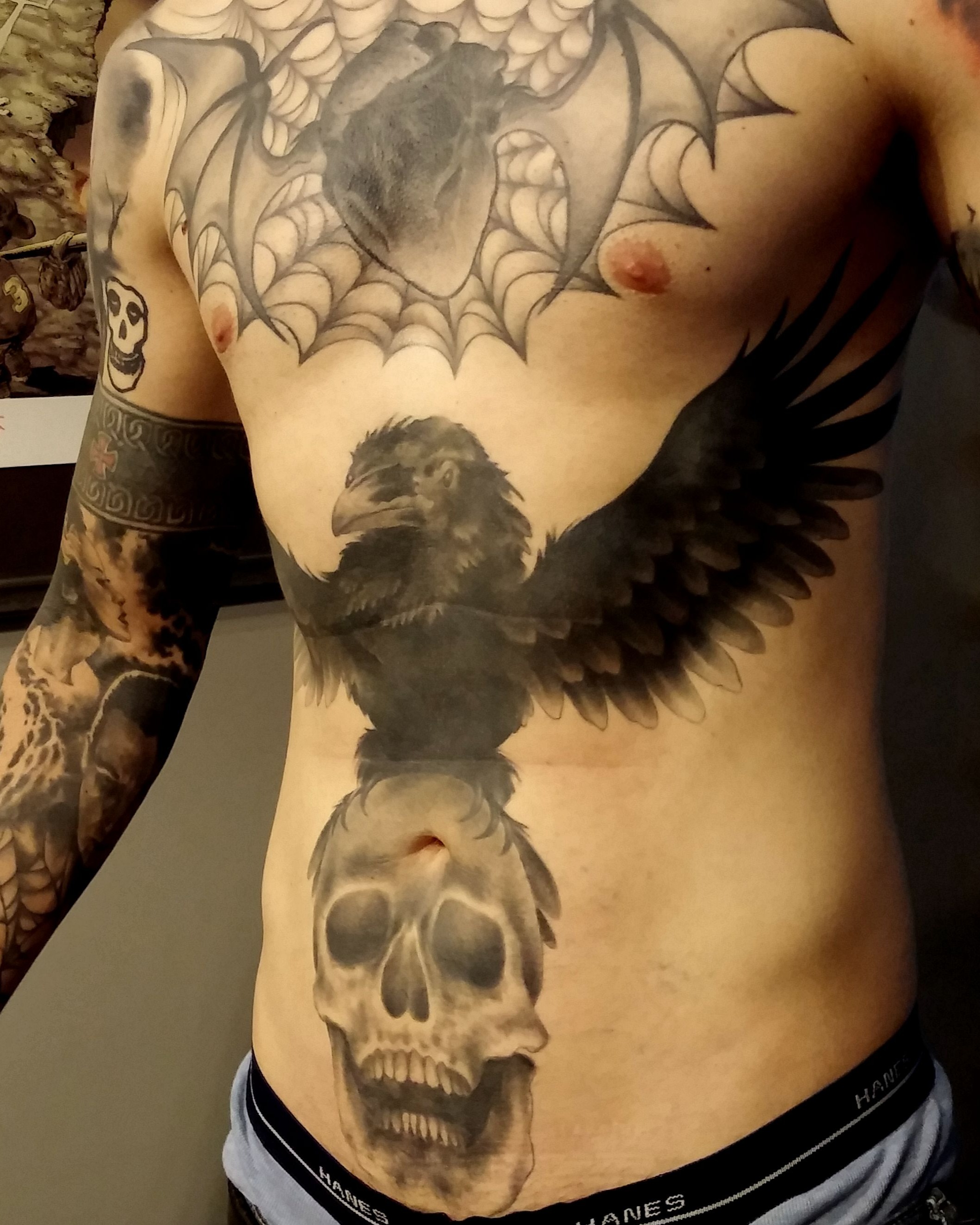 Crow and skull realism tattoo on the torso by Dave Chercourt, Willoughby, Ohio