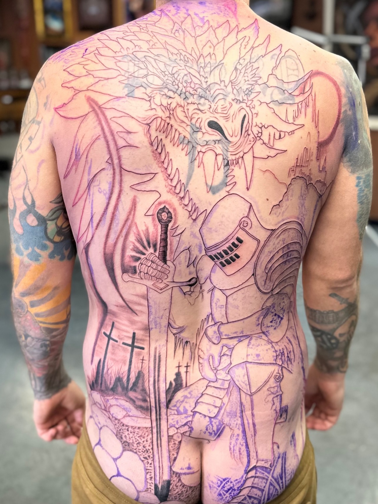 Dragon slaying knight neo-traditional tattoo on the back by Eugene Oregon tattoo artist