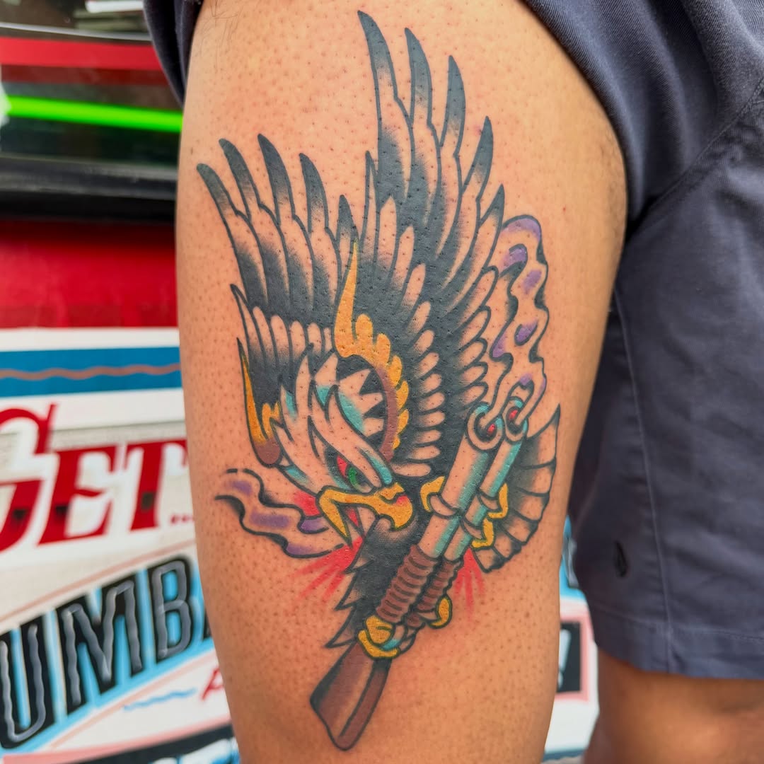 Eagle and rifle American traditional tattoo on the forearm by Max mogstad