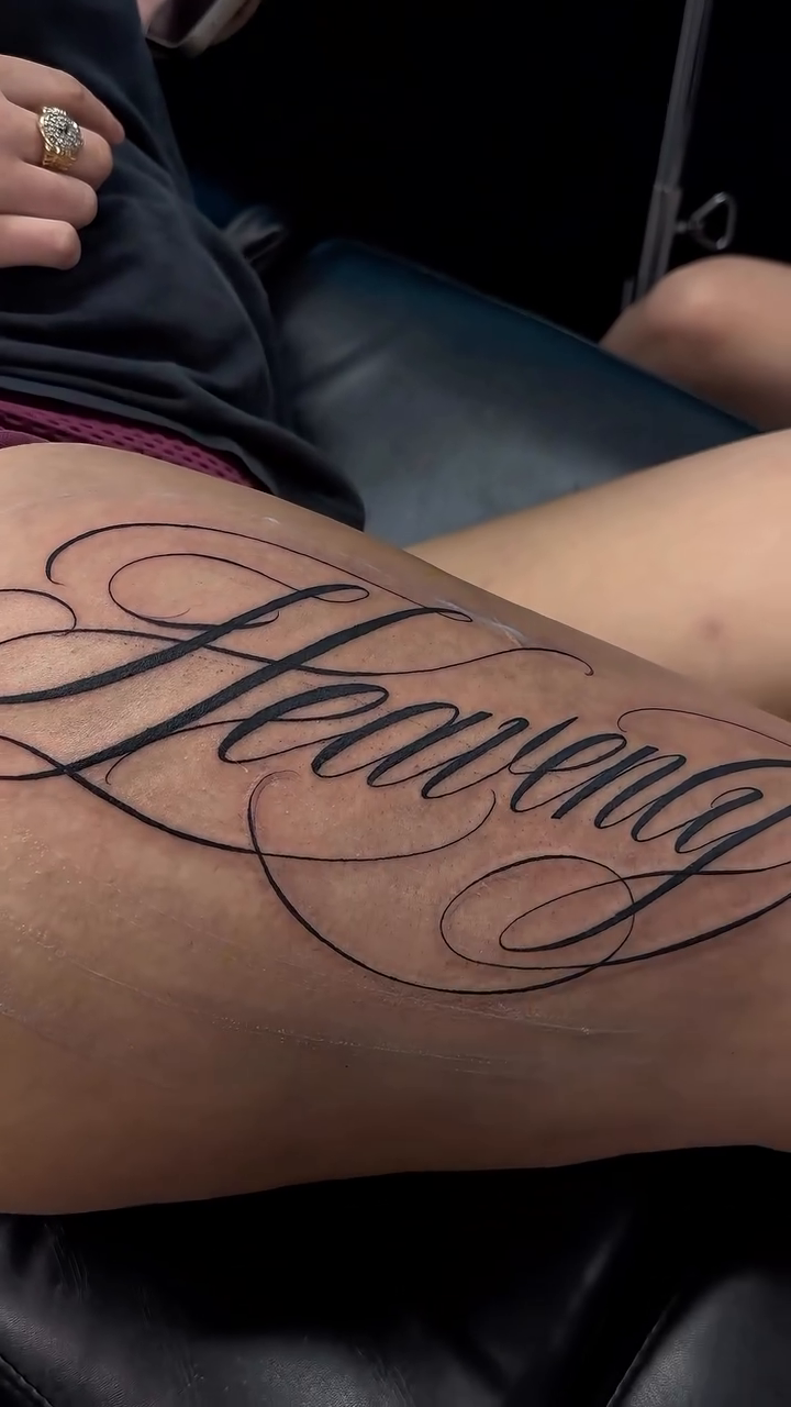 Tattoo by @bendecidatattoo โ lettering_script, black_and_grey