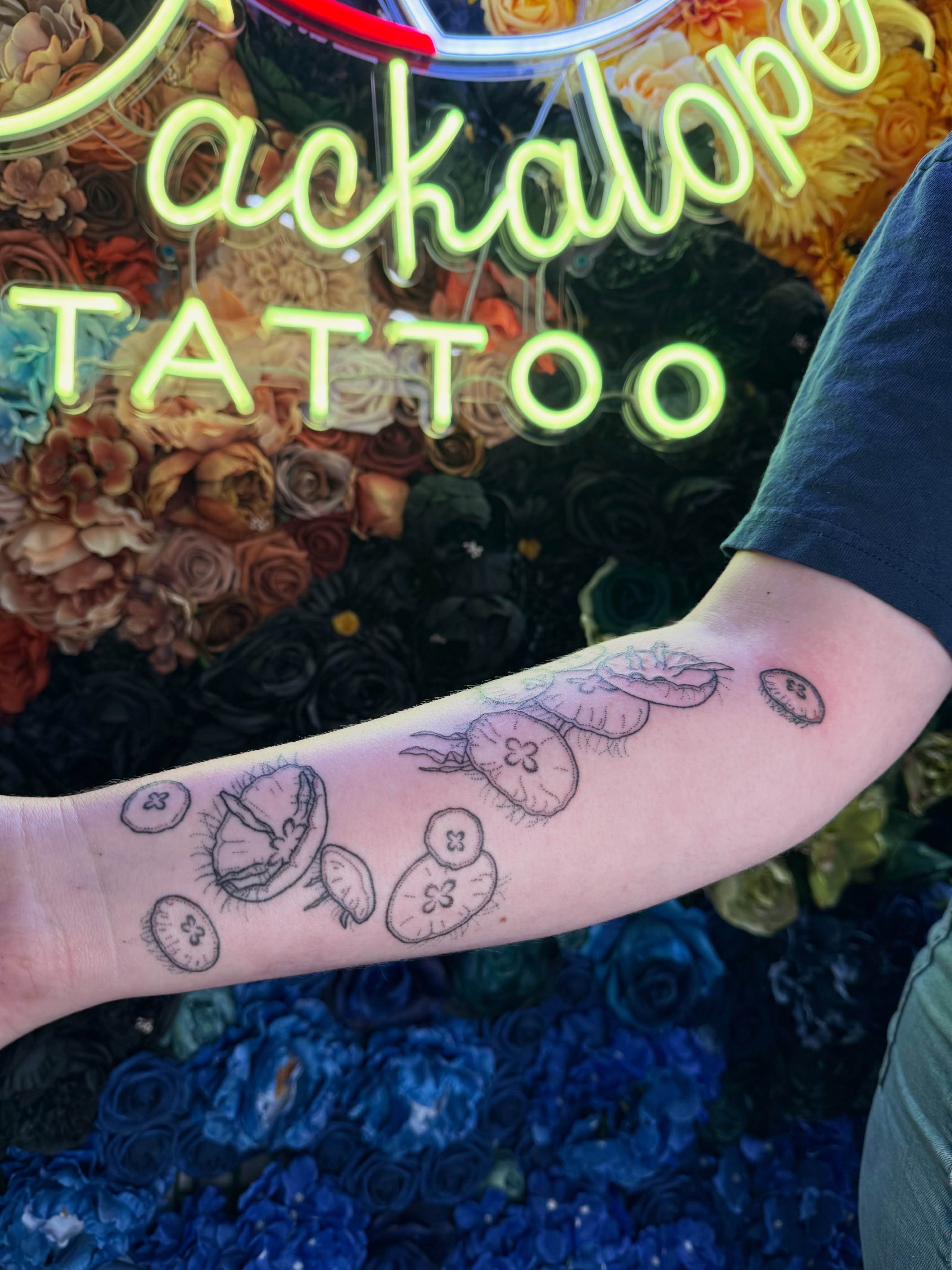 Mushrooms black and grey tattoo on the forearm by Handpoke Tattoo Artist, Minneapolis, Minnesota