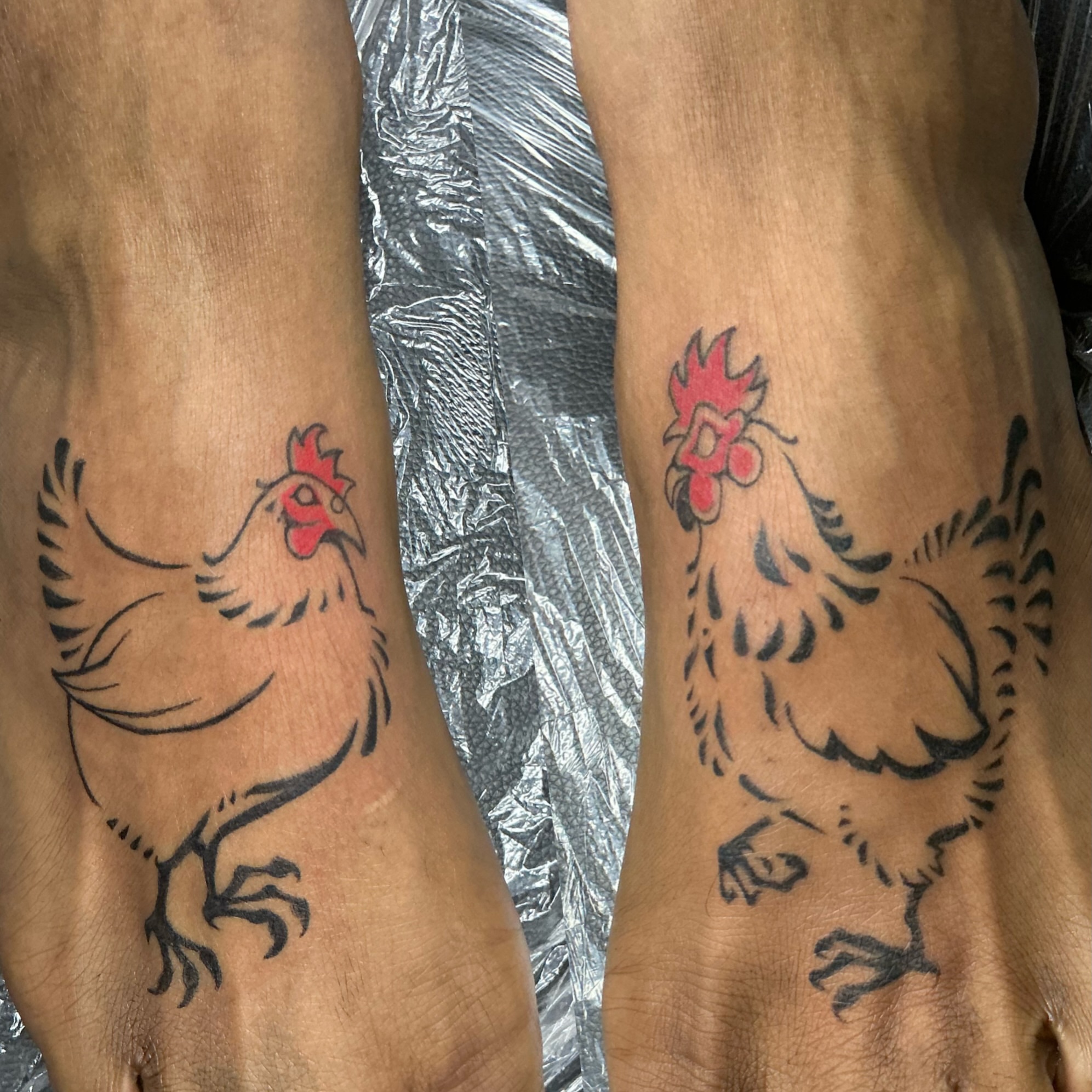 Rooster American traditional tattoo on the forearm by Isaac Mccavitt