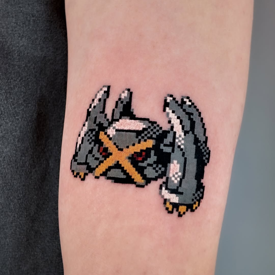 Tattoo by @mrpixel.tattooer — anime, pixel_art