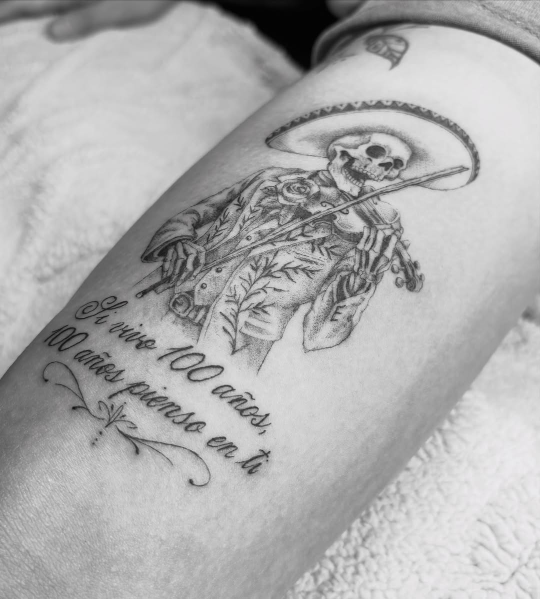 Skeleton playing violin realism tattoo on the forearm by @secretlinetattoo