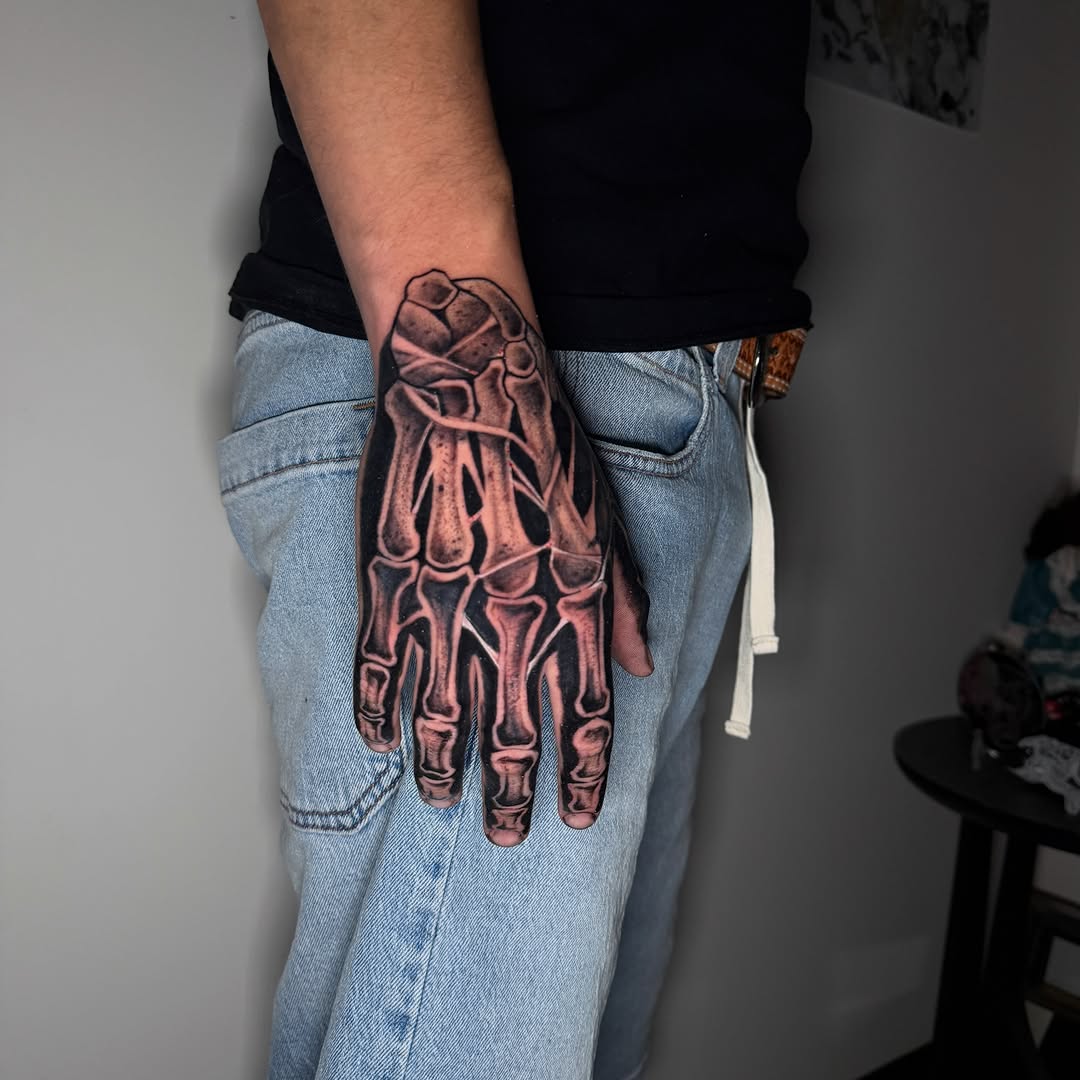Tattoo by @tatts.x.hustler — realism, black_and_grey