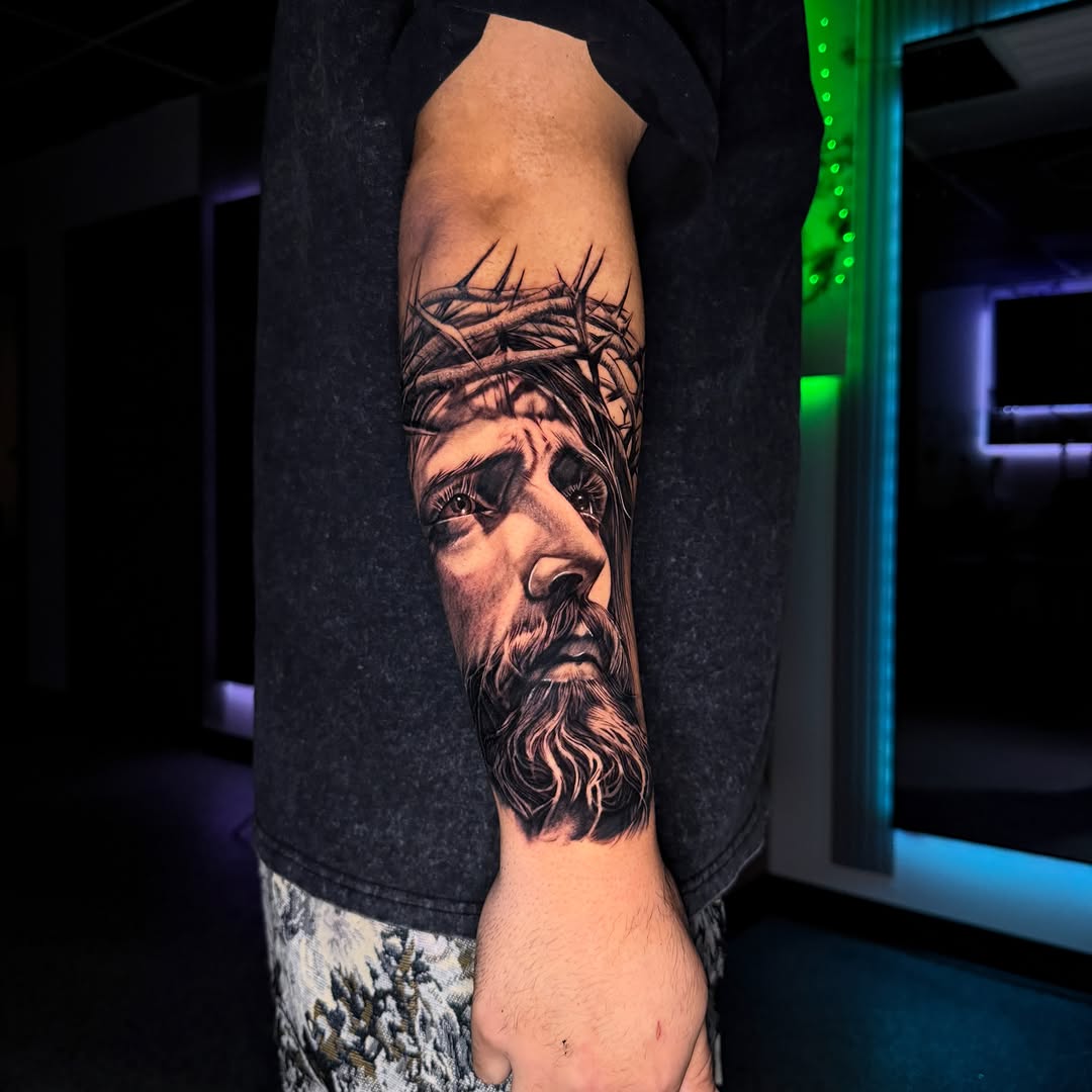 Tattoo by @tatts.x.hustler — realism, black_and_grey