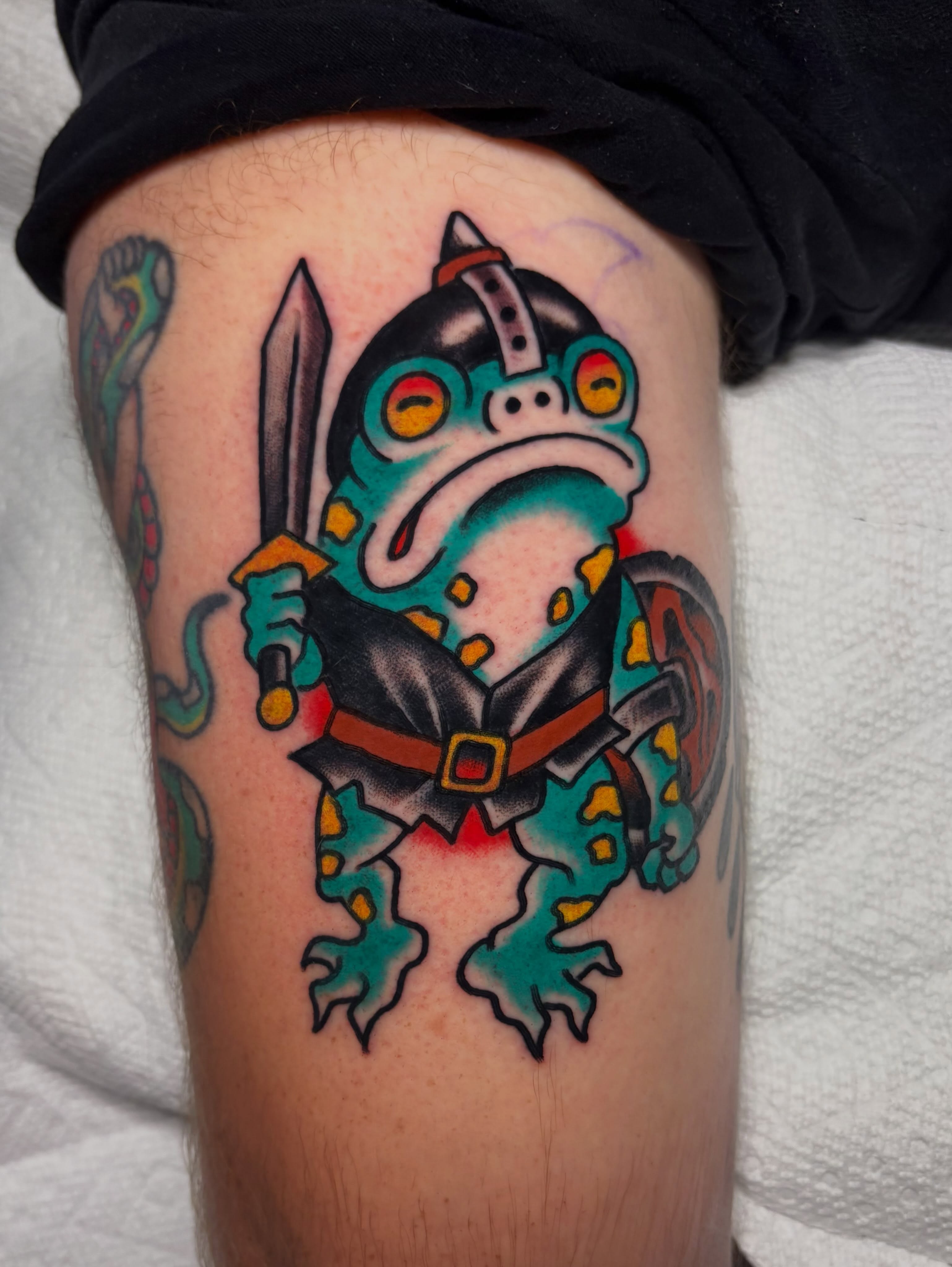 Frog warrior American traditional tattoo on the thigh by David Armacost, Cincinnati, Ohio