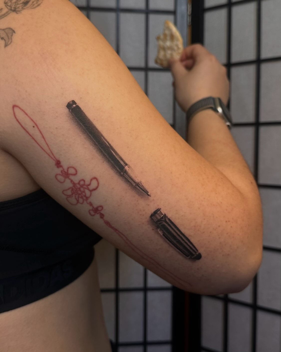 Pen black and grey tattoo on the forearm by jun