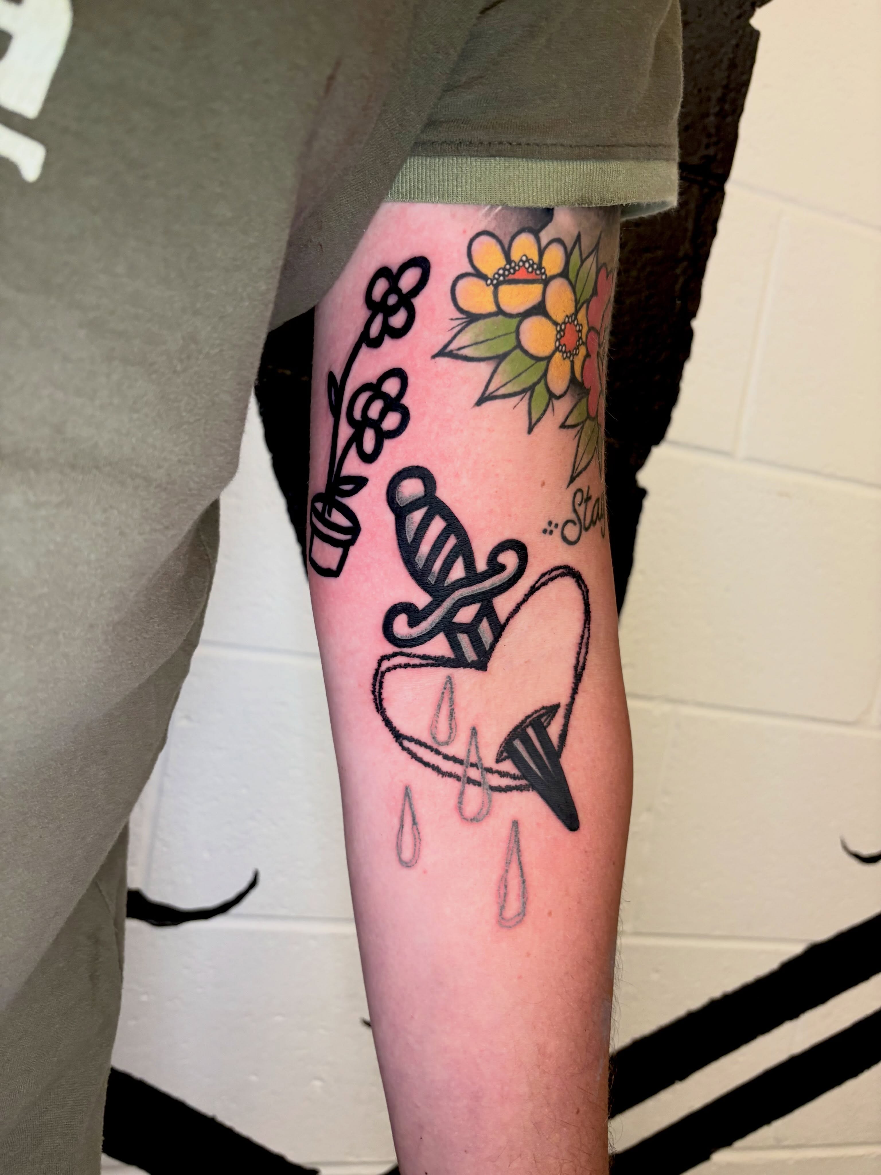 Heart with butterfly American traditional tattoo on the forearm by @lil_stinker_5000, Portland, Oregon