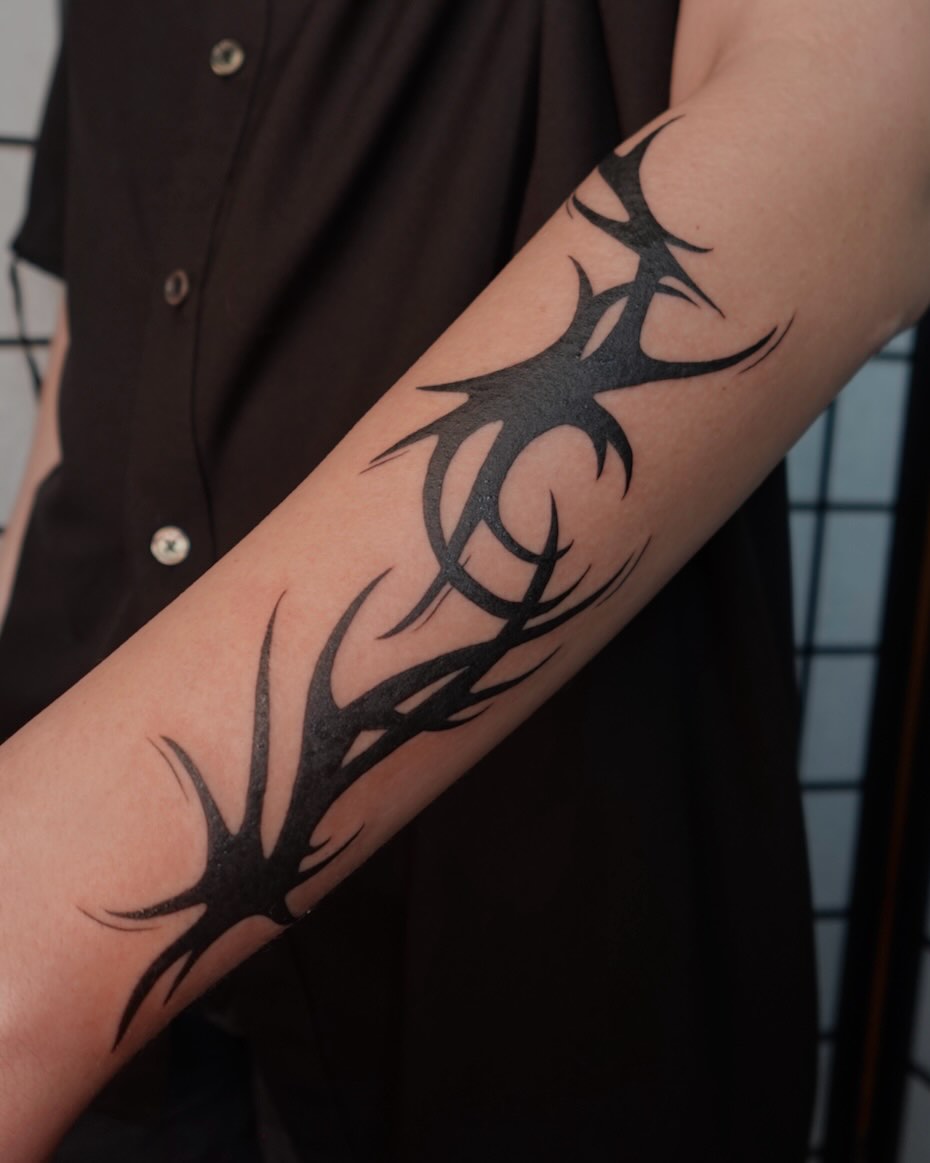 Thorns tribal tattoo on the forearm by jun