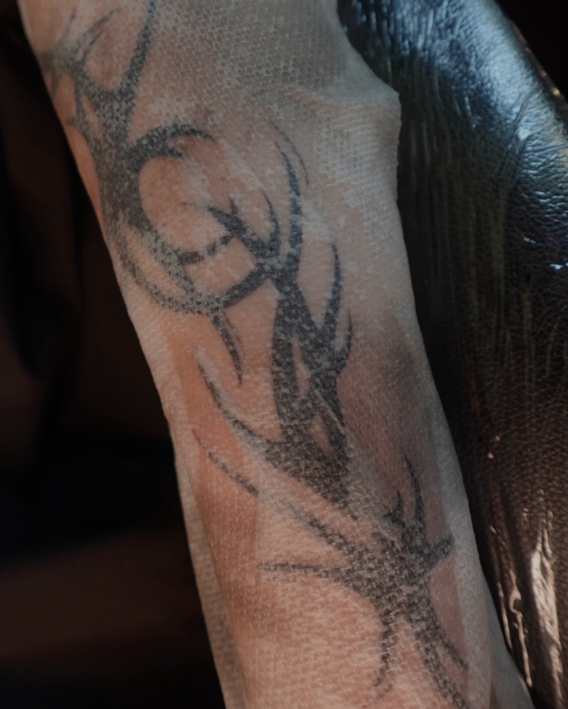Antlers tribal tattoo on the forearm by jun