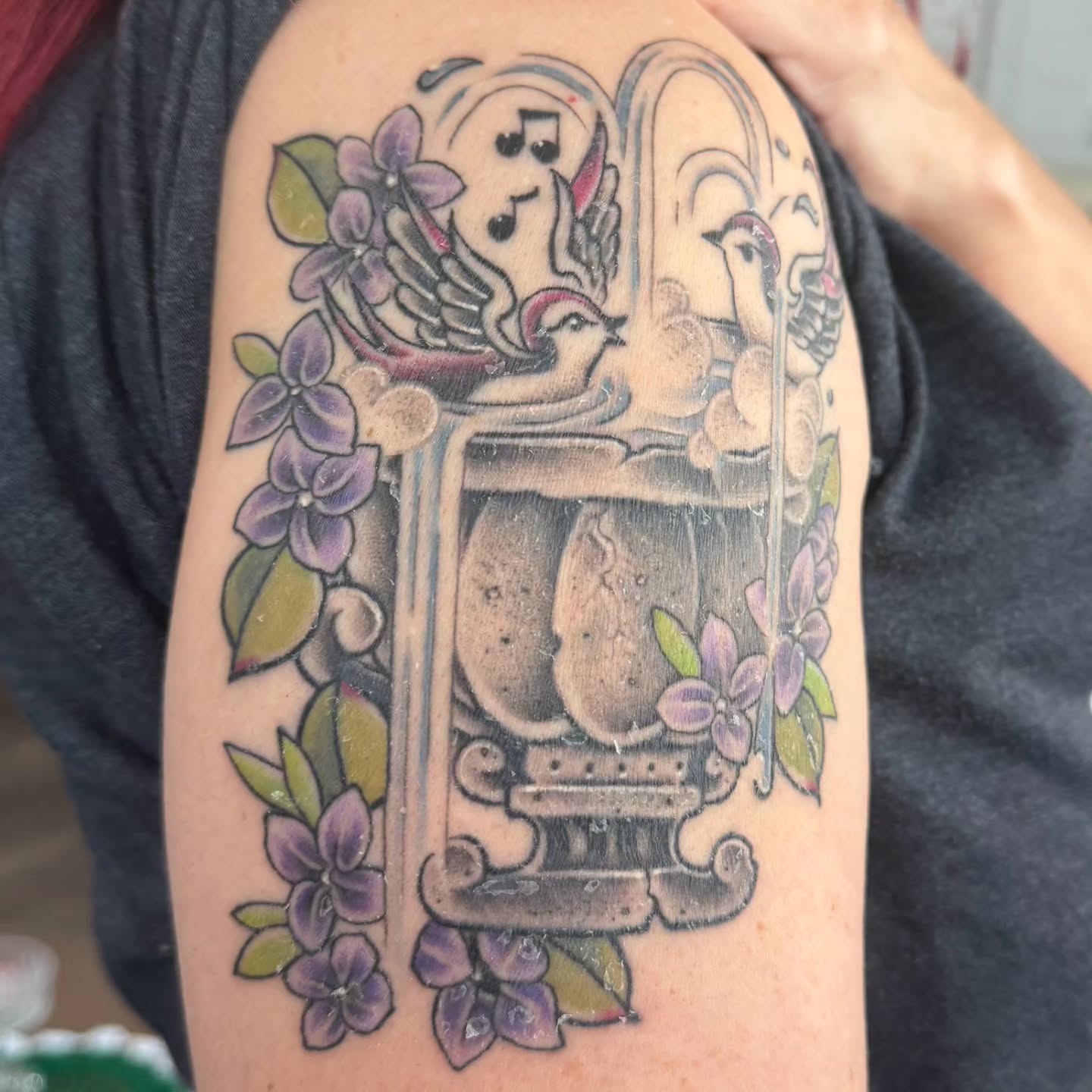 Music box American traditional tattoo on the shoulder by Randyz Tattyz