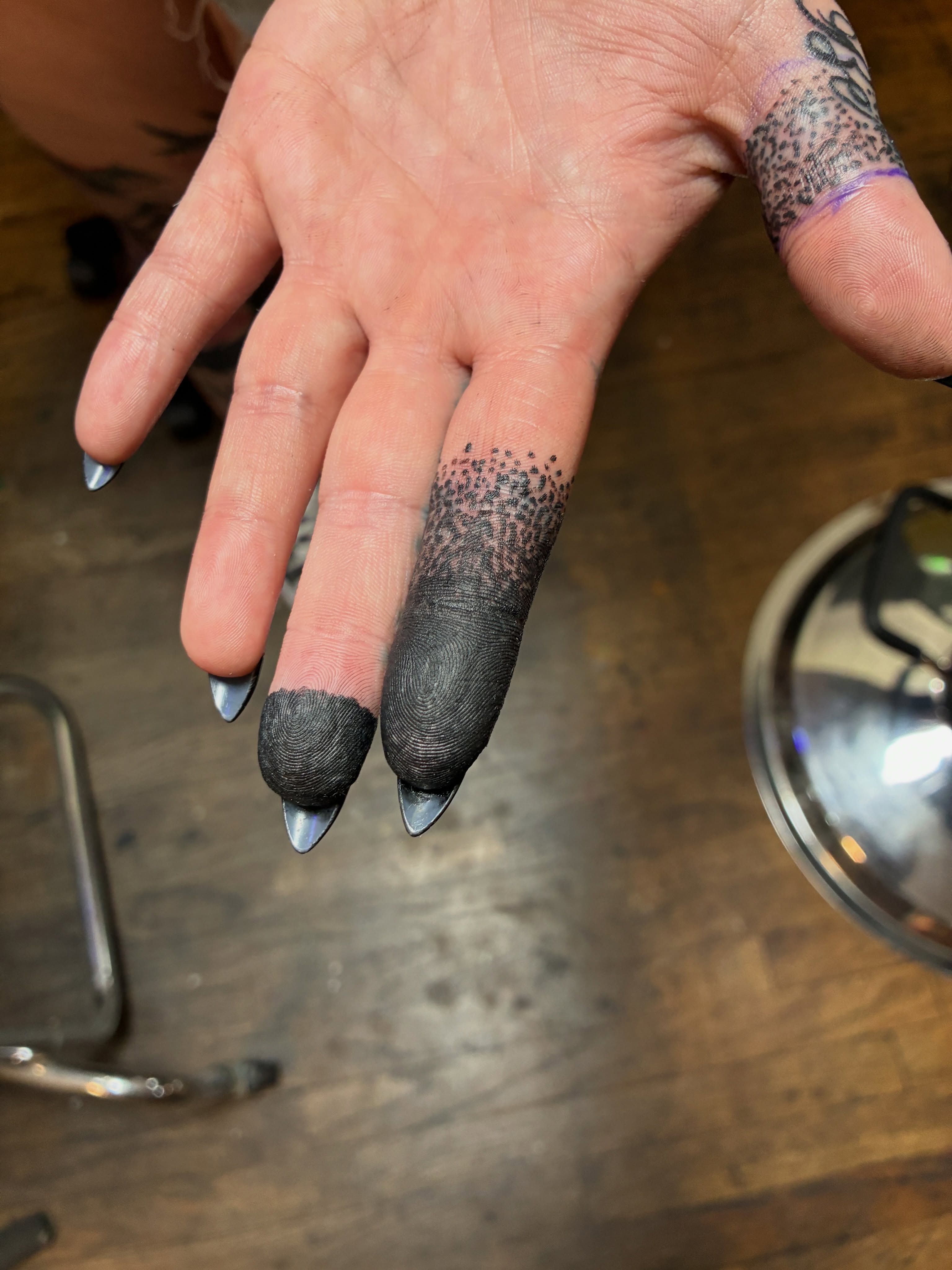Finger nail art dotwork tattoo on the hand by Seattle Tattoo Artist