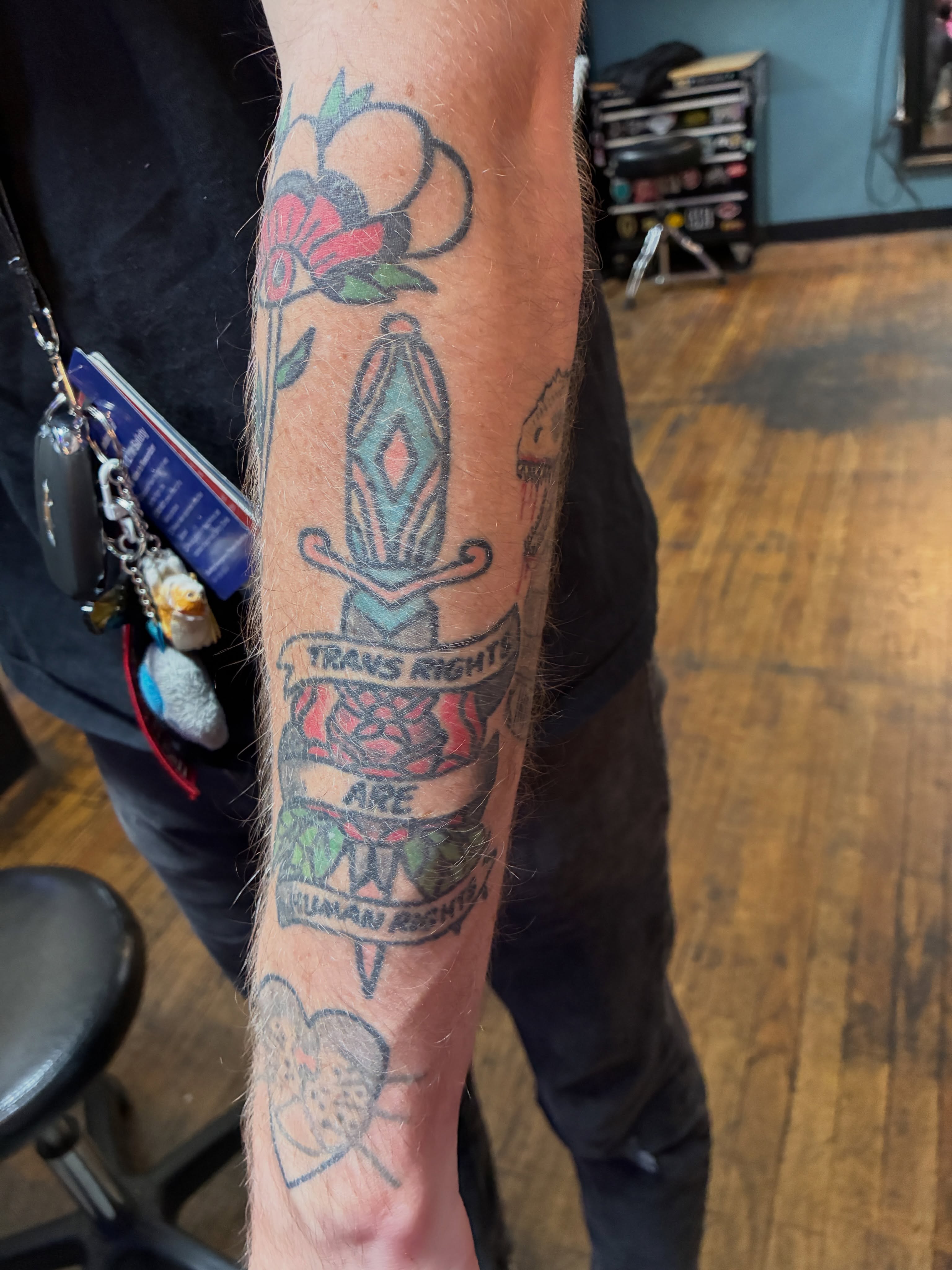 Trans rights American traditional tattoo on the forearm by Seattle Tattoo Artist