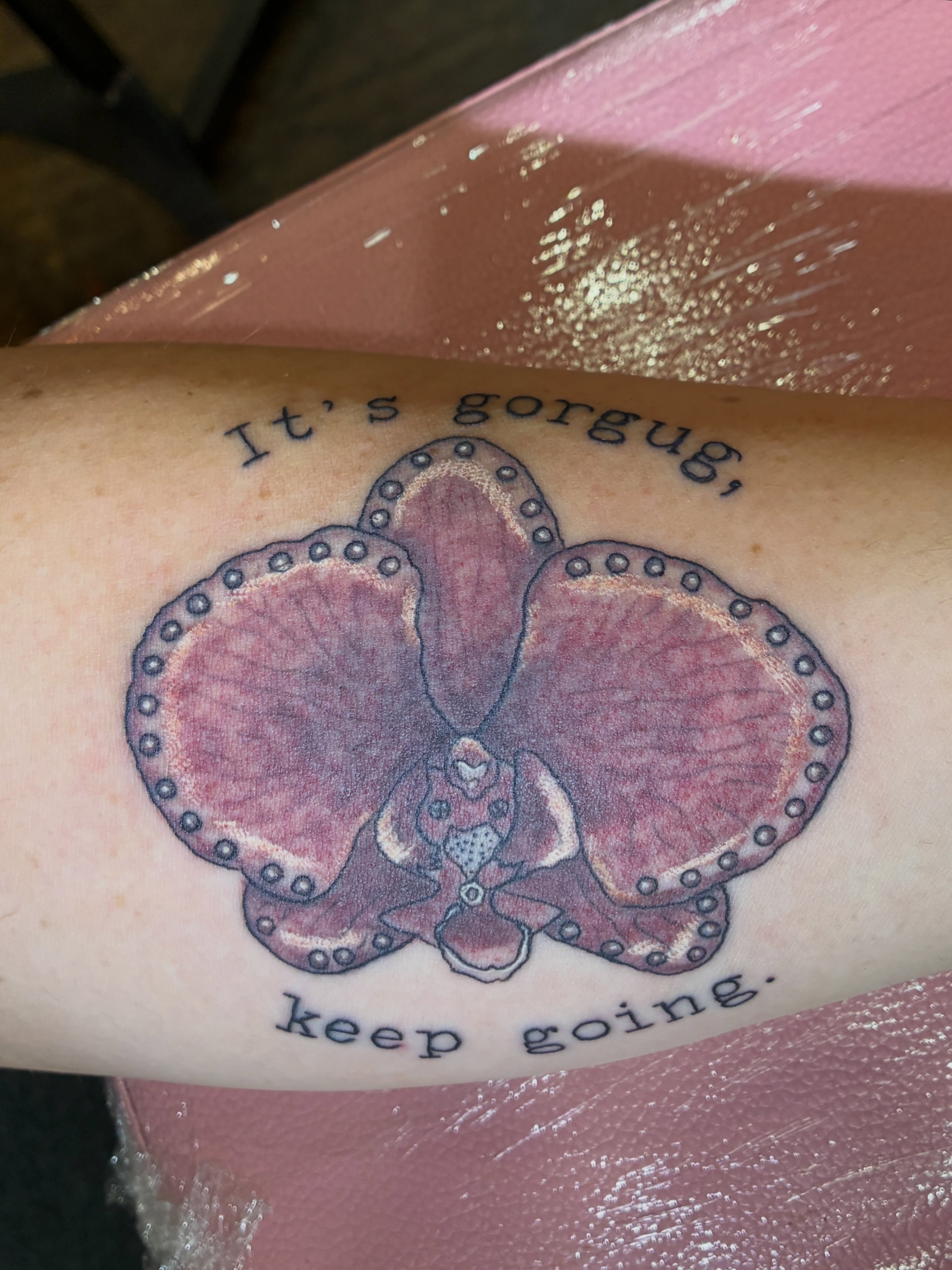 Orchid dotwork tattoo on the forearm by Seattle Tattoo Artist