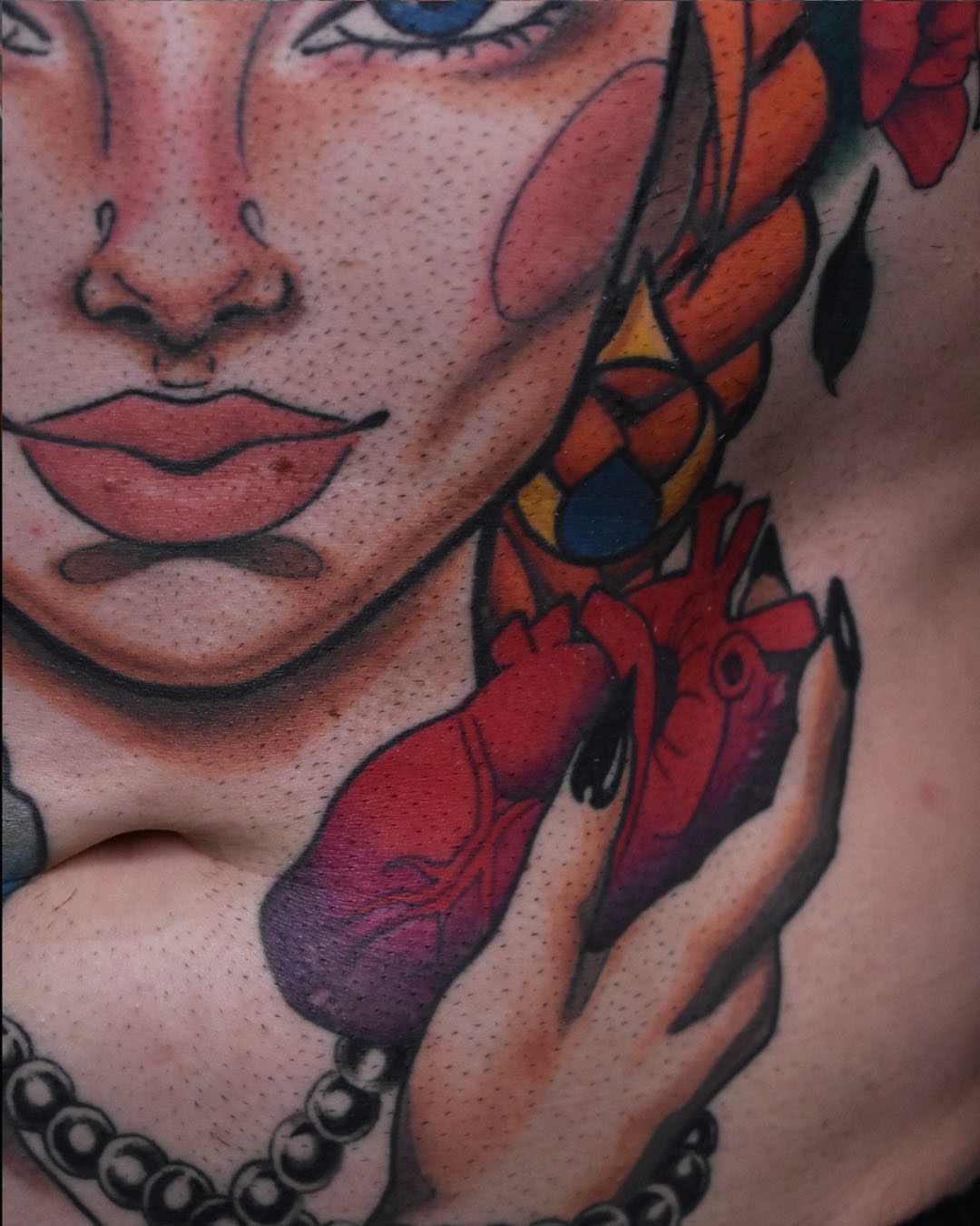 Heart realism tattoo on the chest by Erin Isaacs