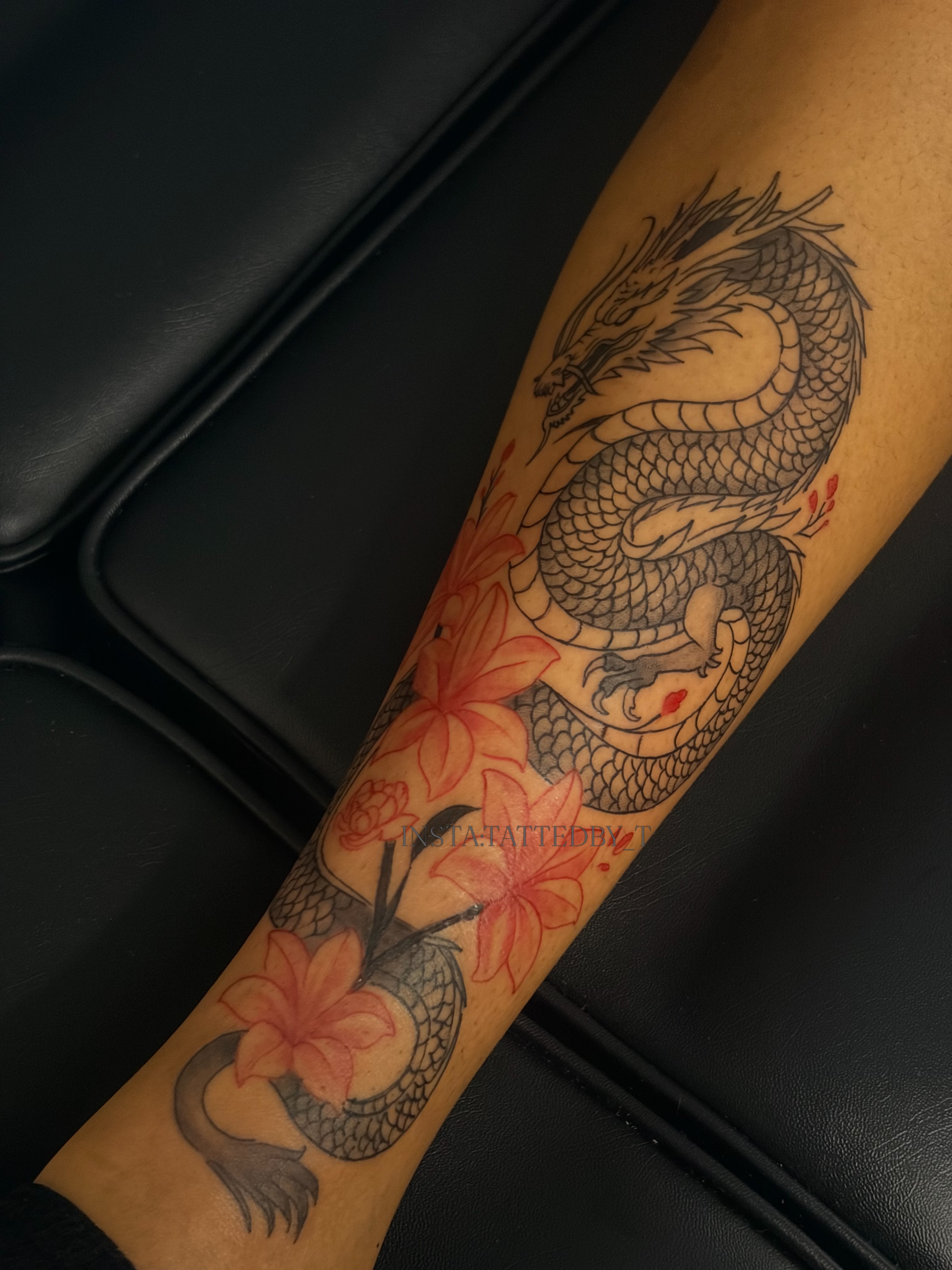 Dragon and flowers japanese irezumi tattoo on the forearm by Female Cleveland Tat Artist ๐