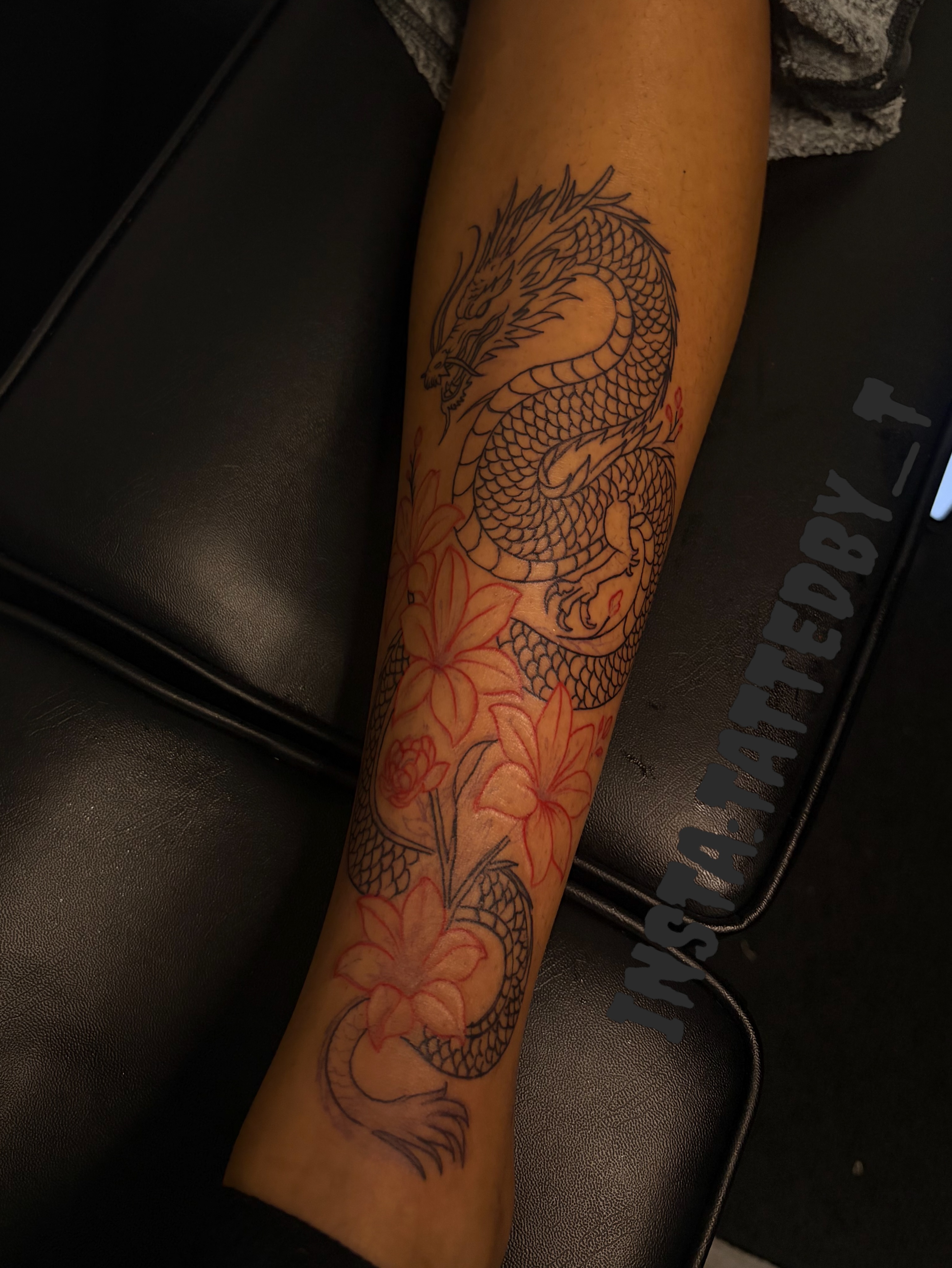 Dragon and flowers japanese irezumi tattoo on the forearm by Female Cleveland Tat Artist ๐