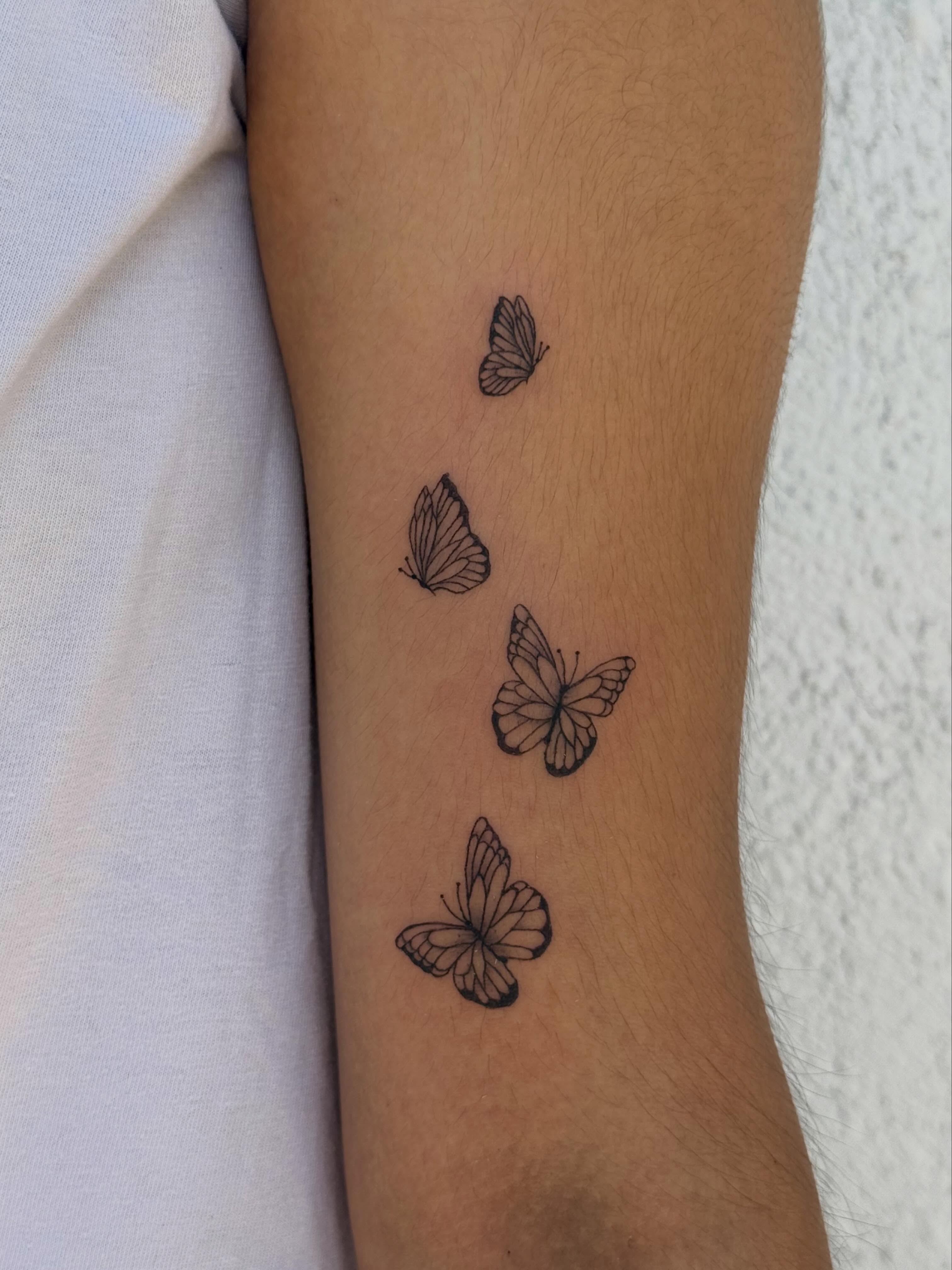 Butterflies black and grey tattoo on the forearm by TATTOO & PIERCING ARTIST ₊˚⊹ ᰔ