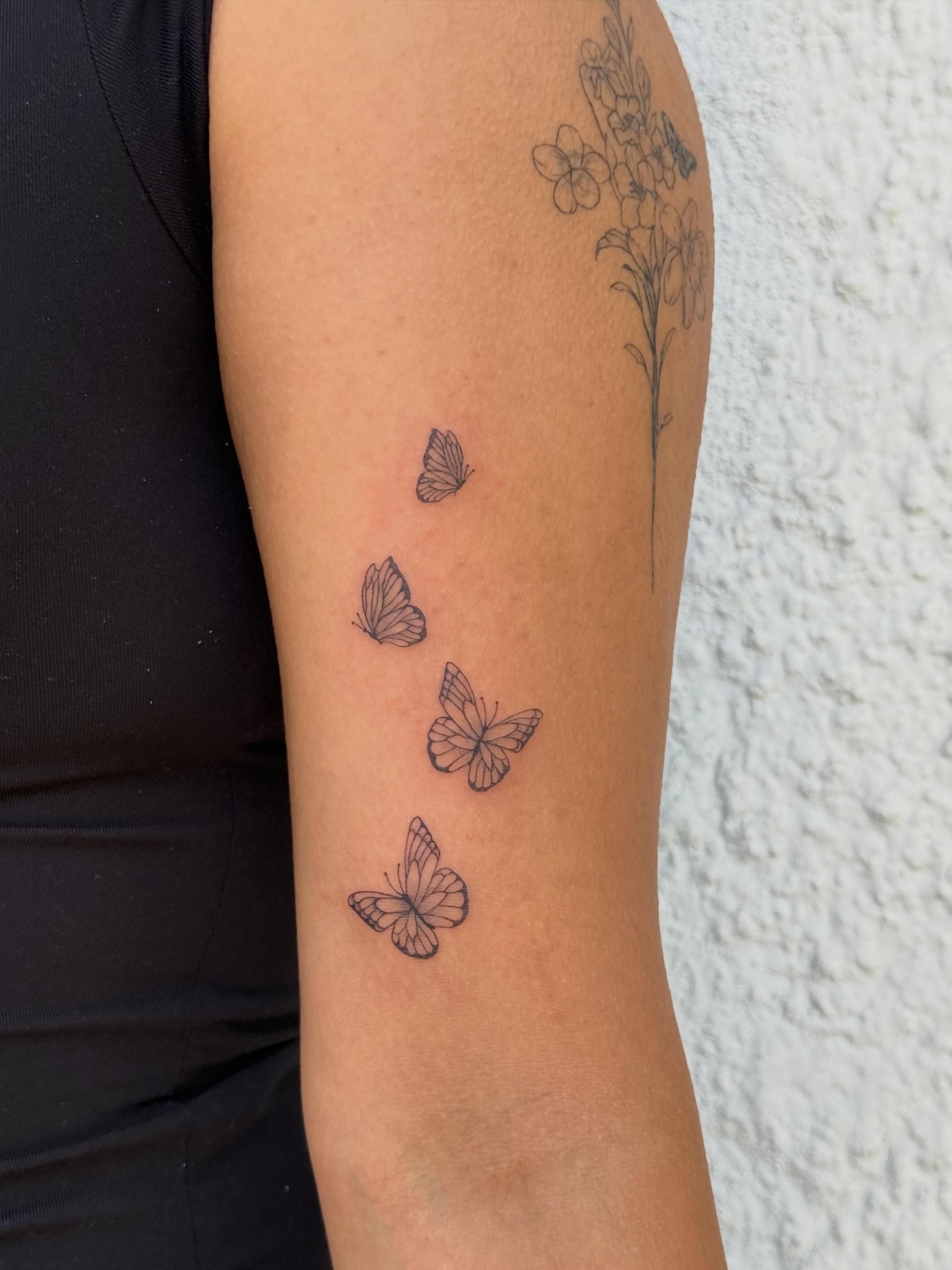 Butterflies black and grey tattoo on the forearm by TATTOO & PIERCING ARTIST ₊˚⊹ ᰔ