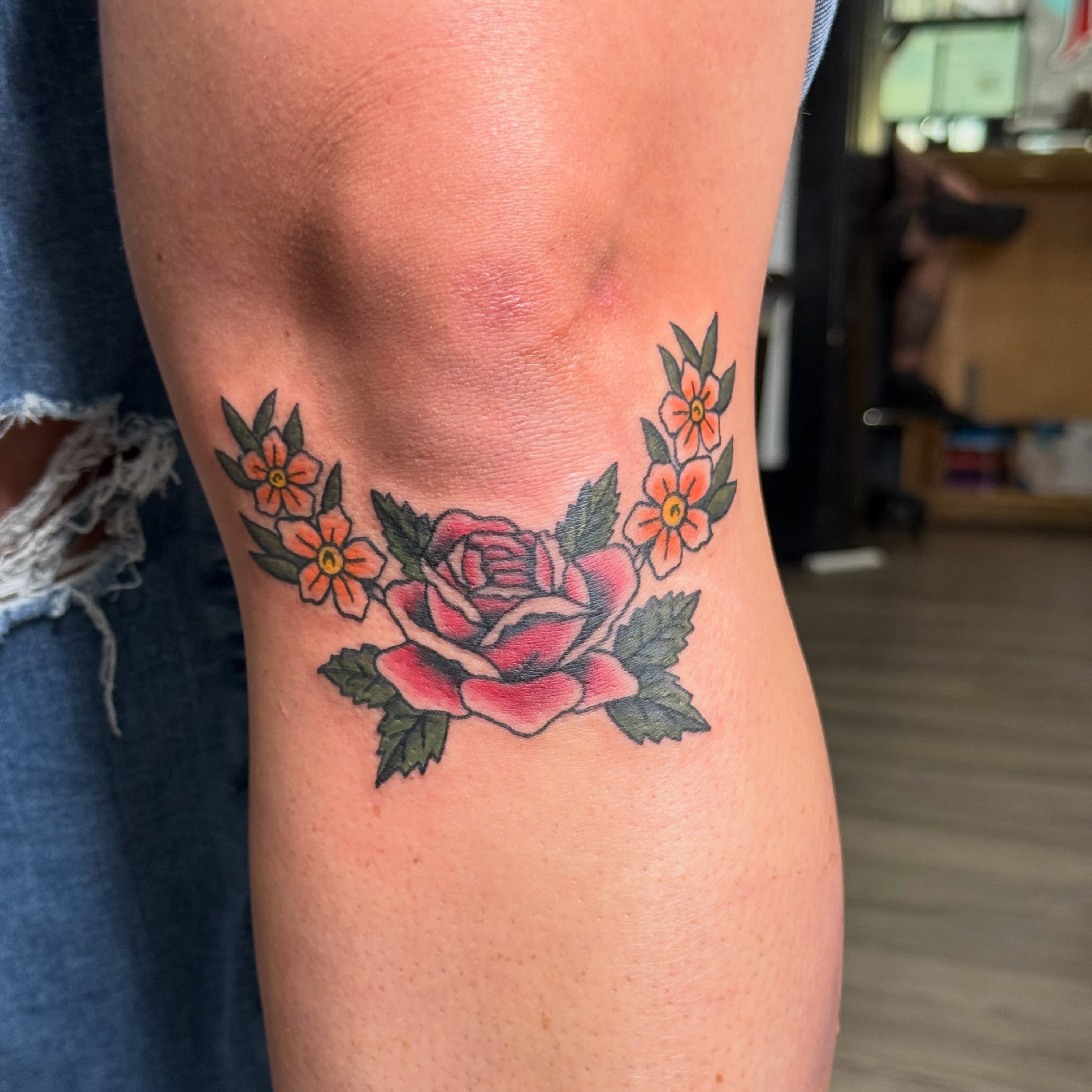 Rose and flowers American traditional tattoo on the thigh by CAT