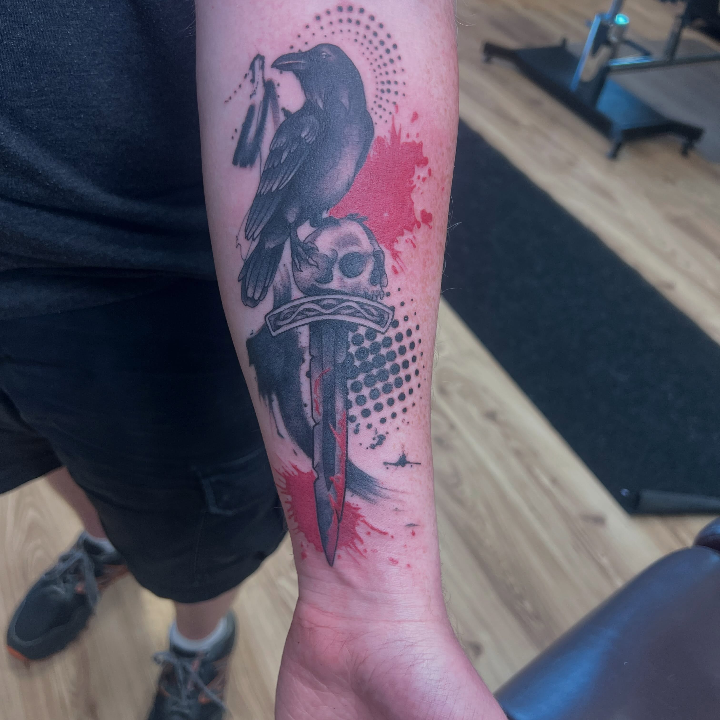 Crow and dagger dotwork tattoo on the forearm by Bailey Goodwin, Ankeny, Iowa