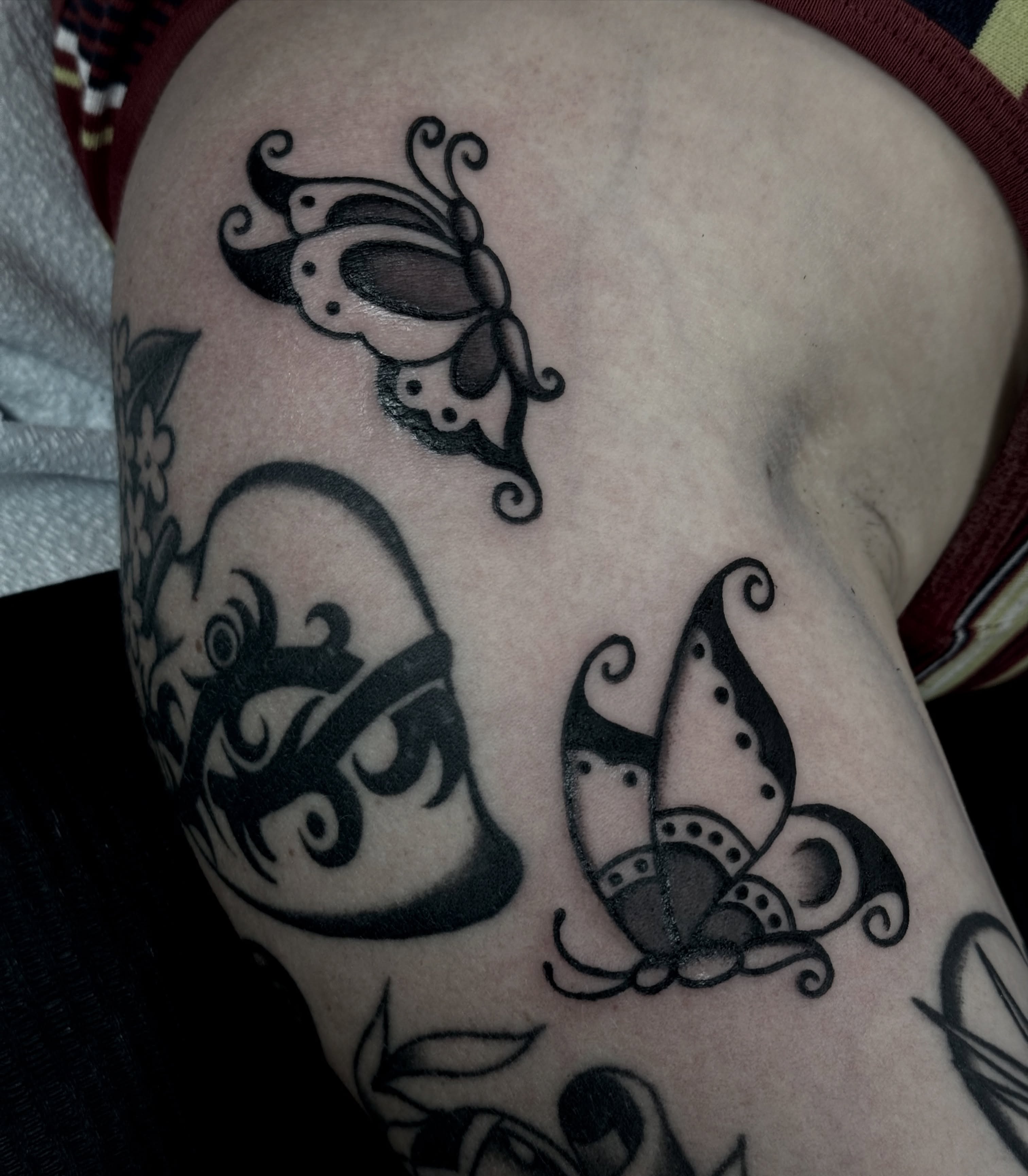Butterfly tribal tattoo on the forearm by Ally noel