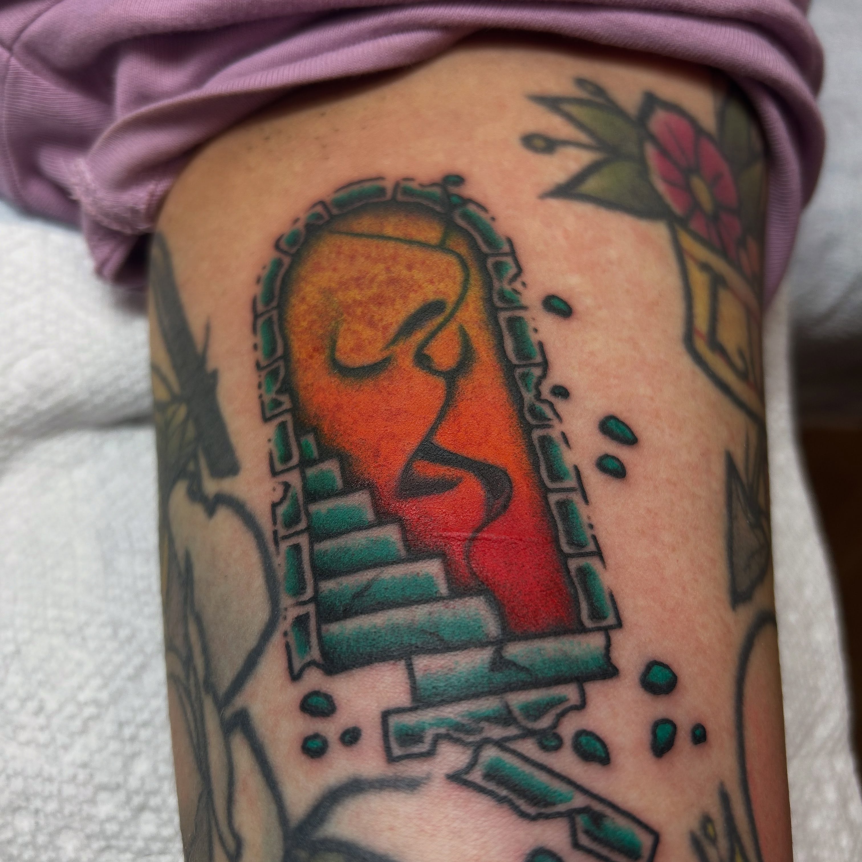 Abstract figure neo-traditional tattoo on the thigh by Stephen Sanchez