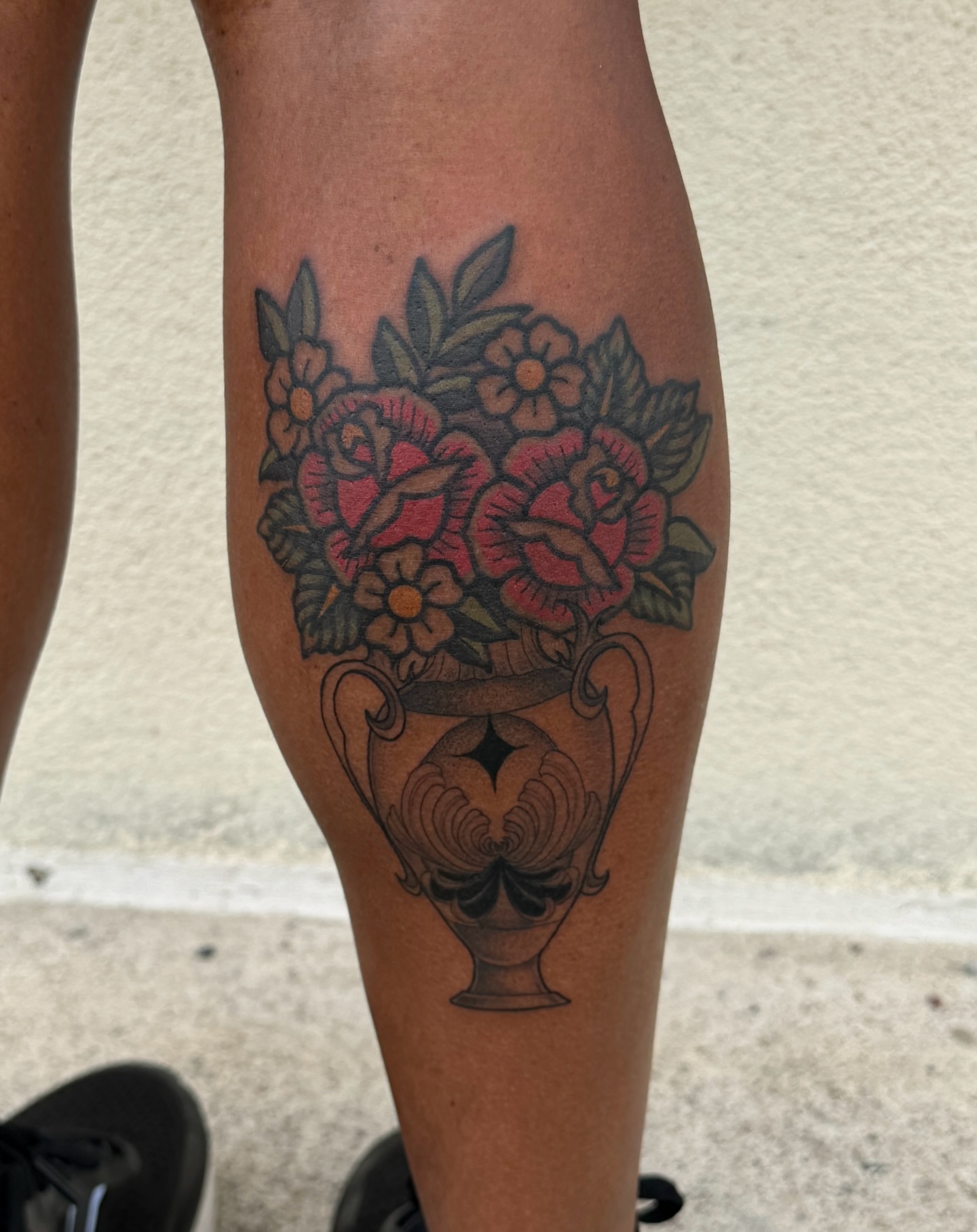 Flower arrangement American traditional tattoo on the calf by Patrick Miller, Huber Heights, Ohio