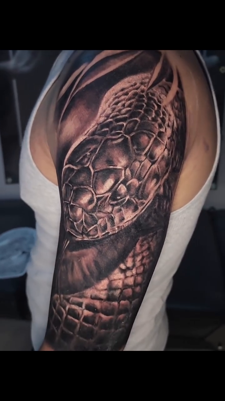 Tattoo by @zachmullinstattoos — realism, black_and_grey