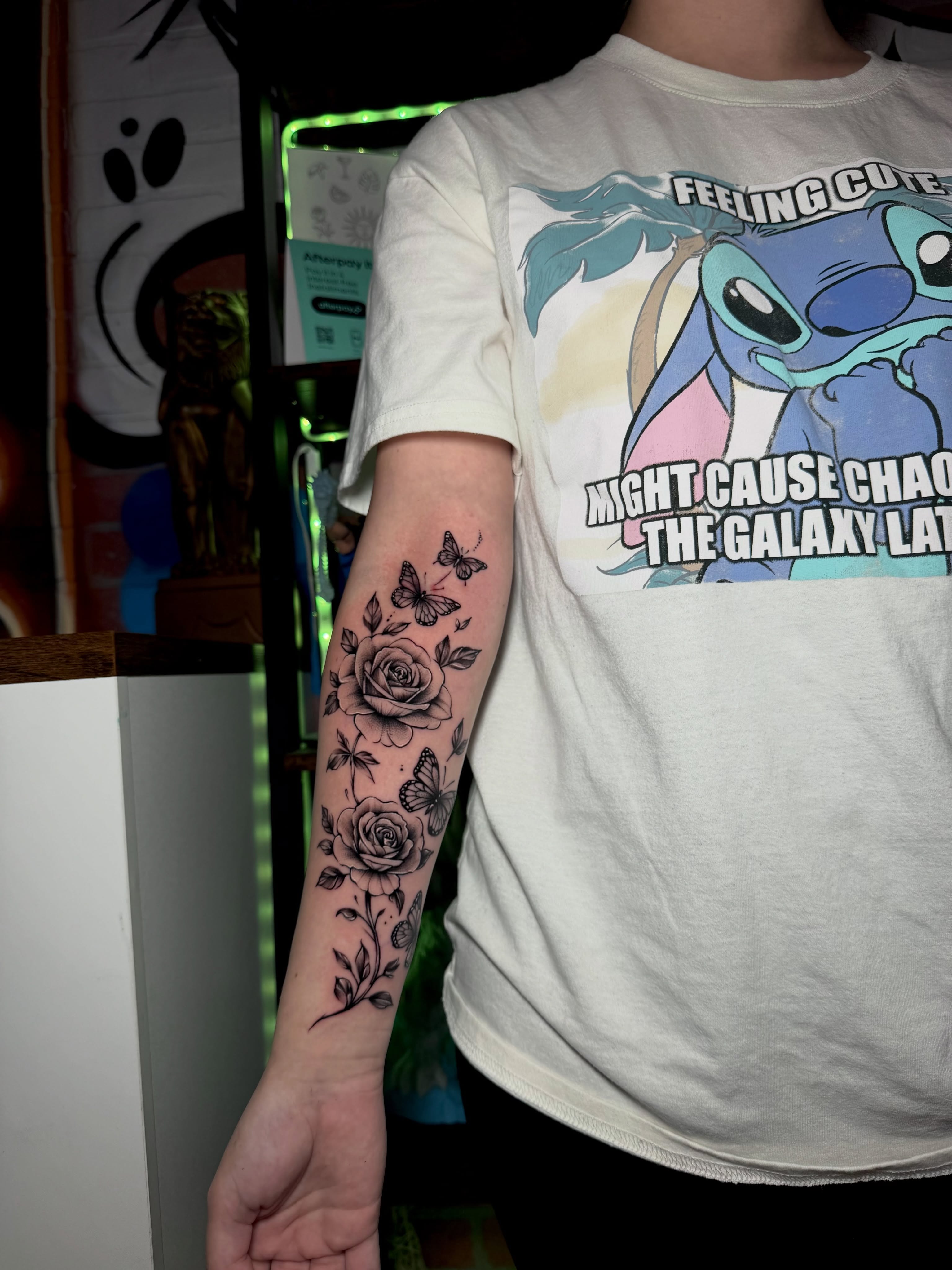 Roses and butterflies black and grey tattoo on the forearm by Keyla Valdes, Miami, Florida
