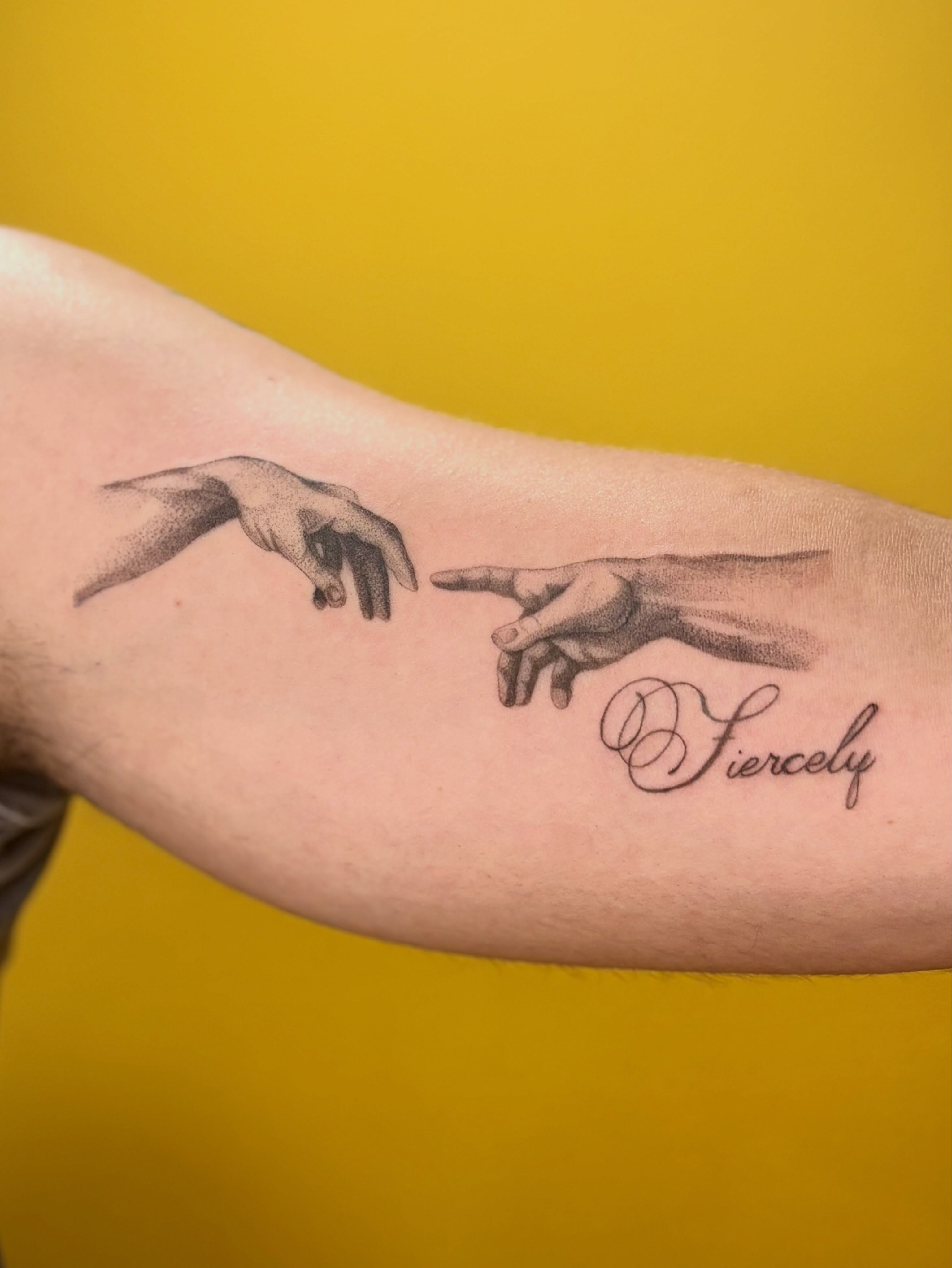 Two hands reaching realism tattoo on the forearm by Jazzlyn Hous