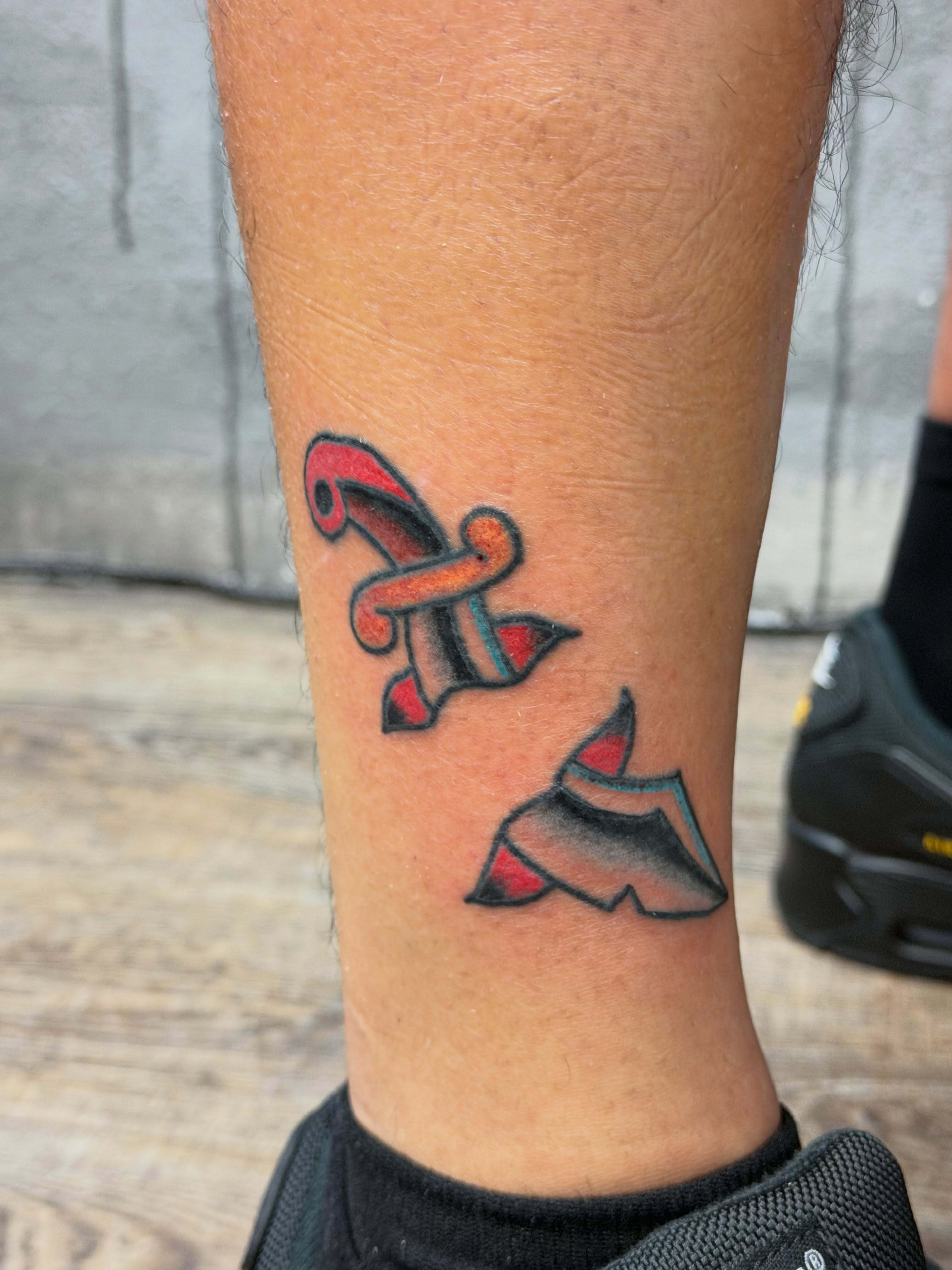 Rocket neo-traditional tattoo on the forearm by Camilo