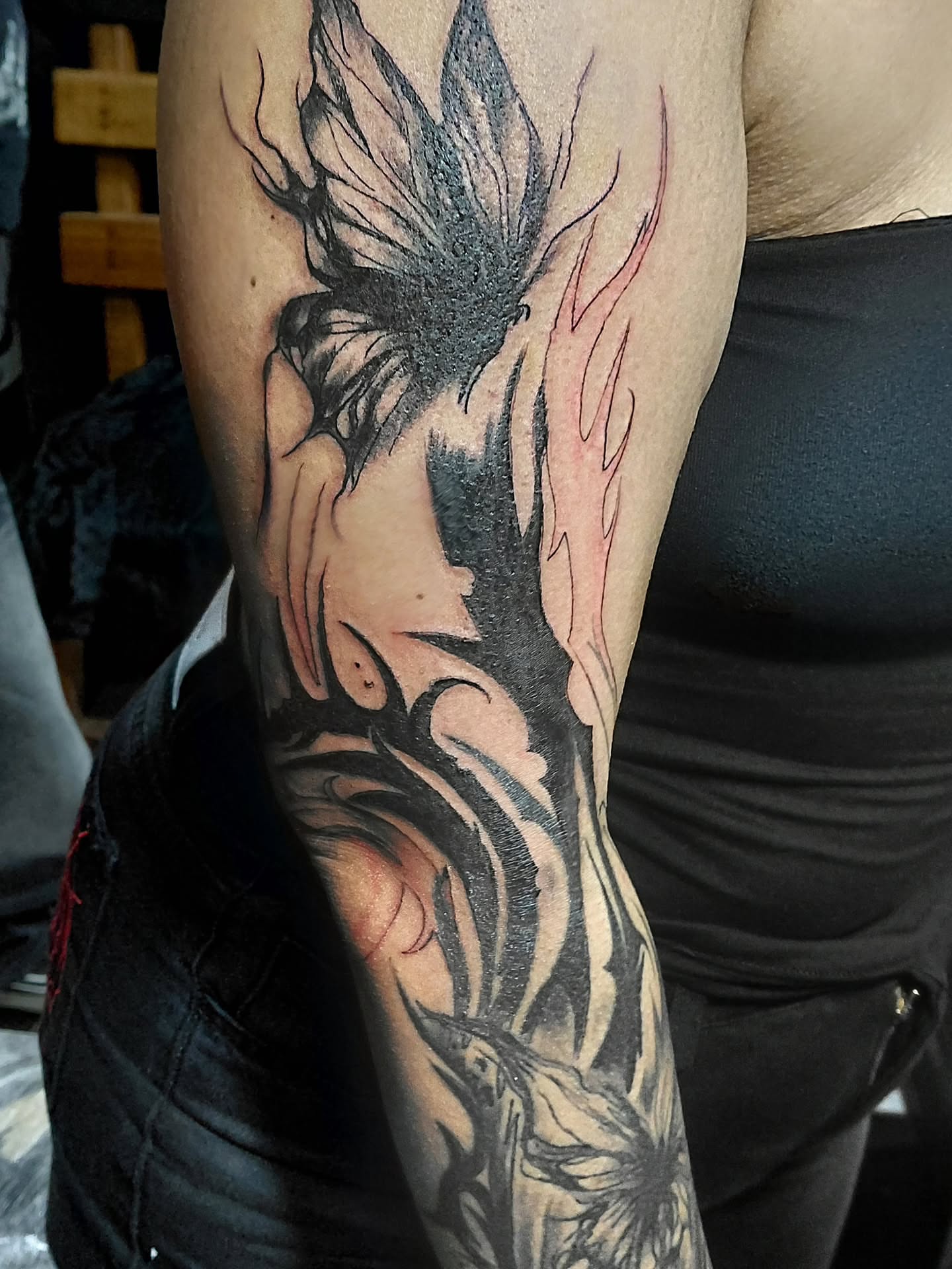 Butterfly black and grey tattoo on the forearm by Jose Rodriguez