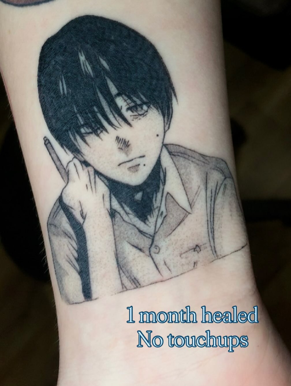 Anime character anime tattoo on the forearm by Maddie Rees