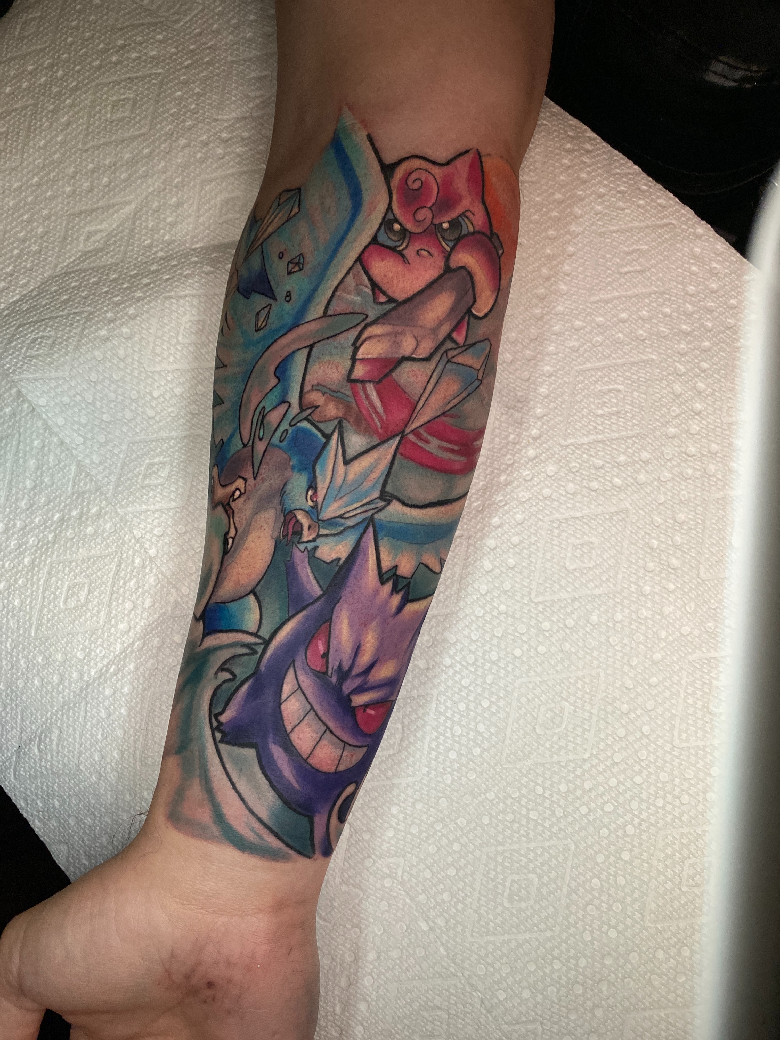 Anime characters anime tattoo on the forearm by Kyle The Cartoon Guy